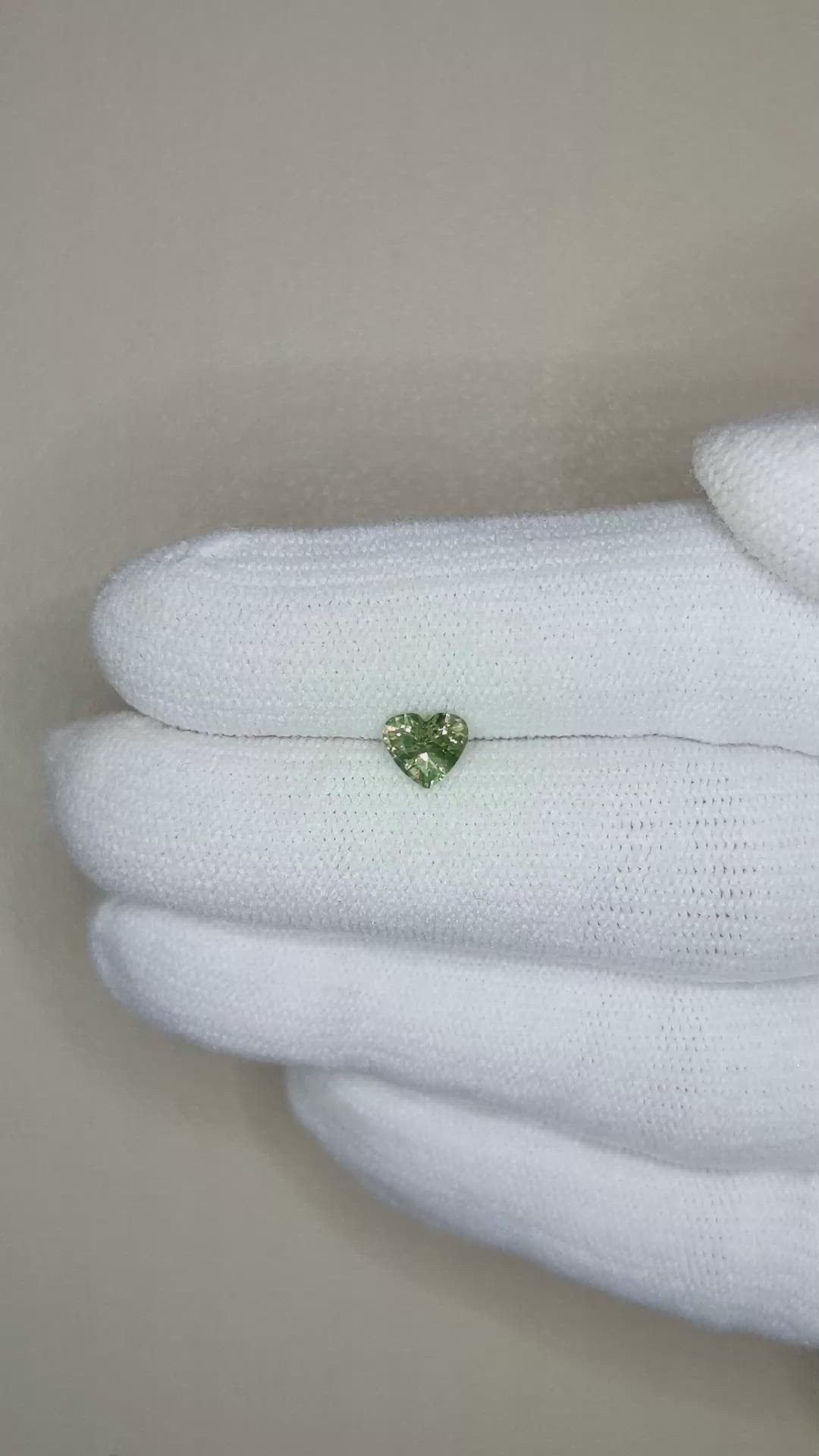 0.58 Ct. Yellowish Green Sapphire from Madagascar Size Video