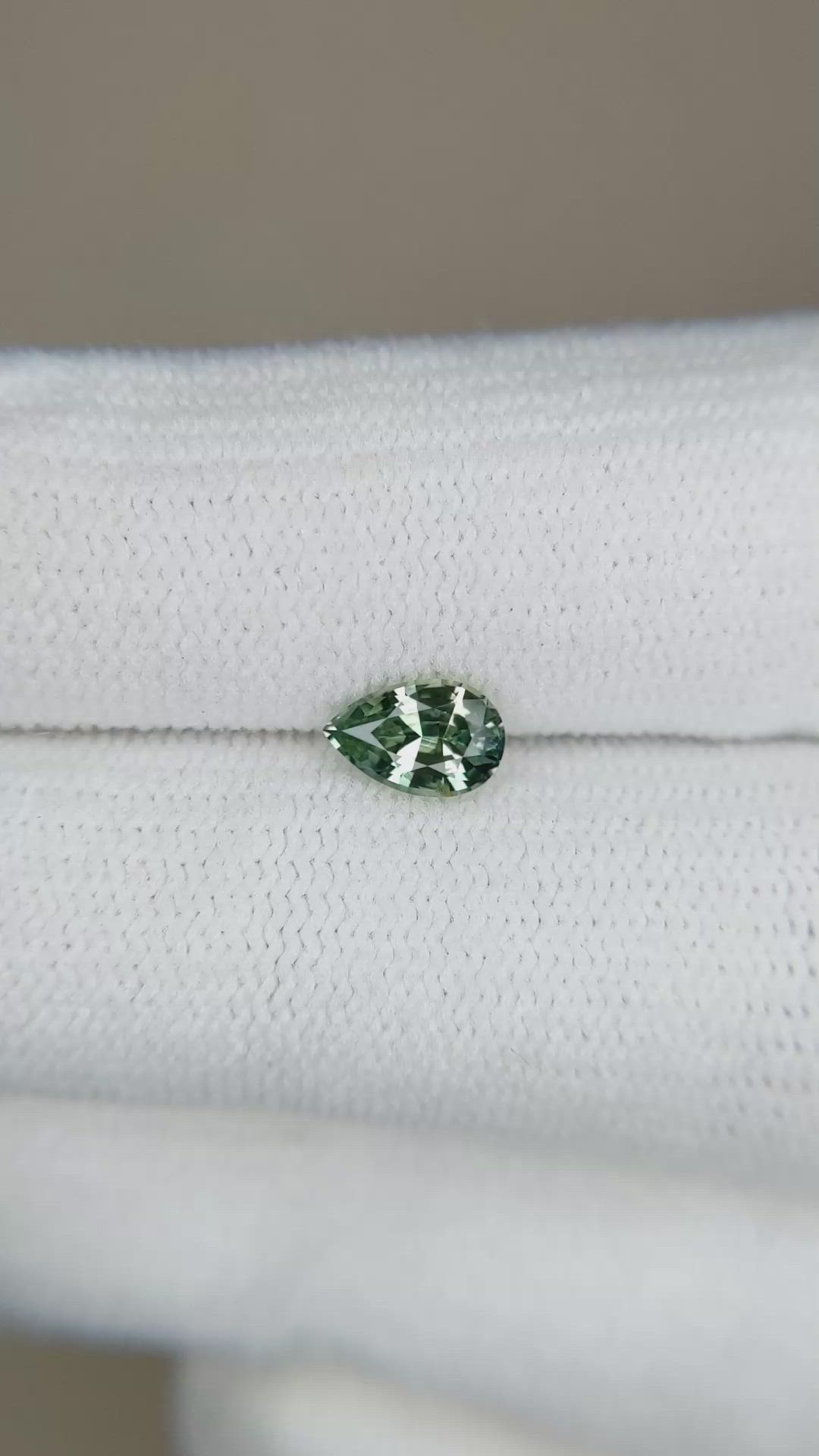 0.63 Ct. Yellowish Green Sapphire from Madagascar Size Video