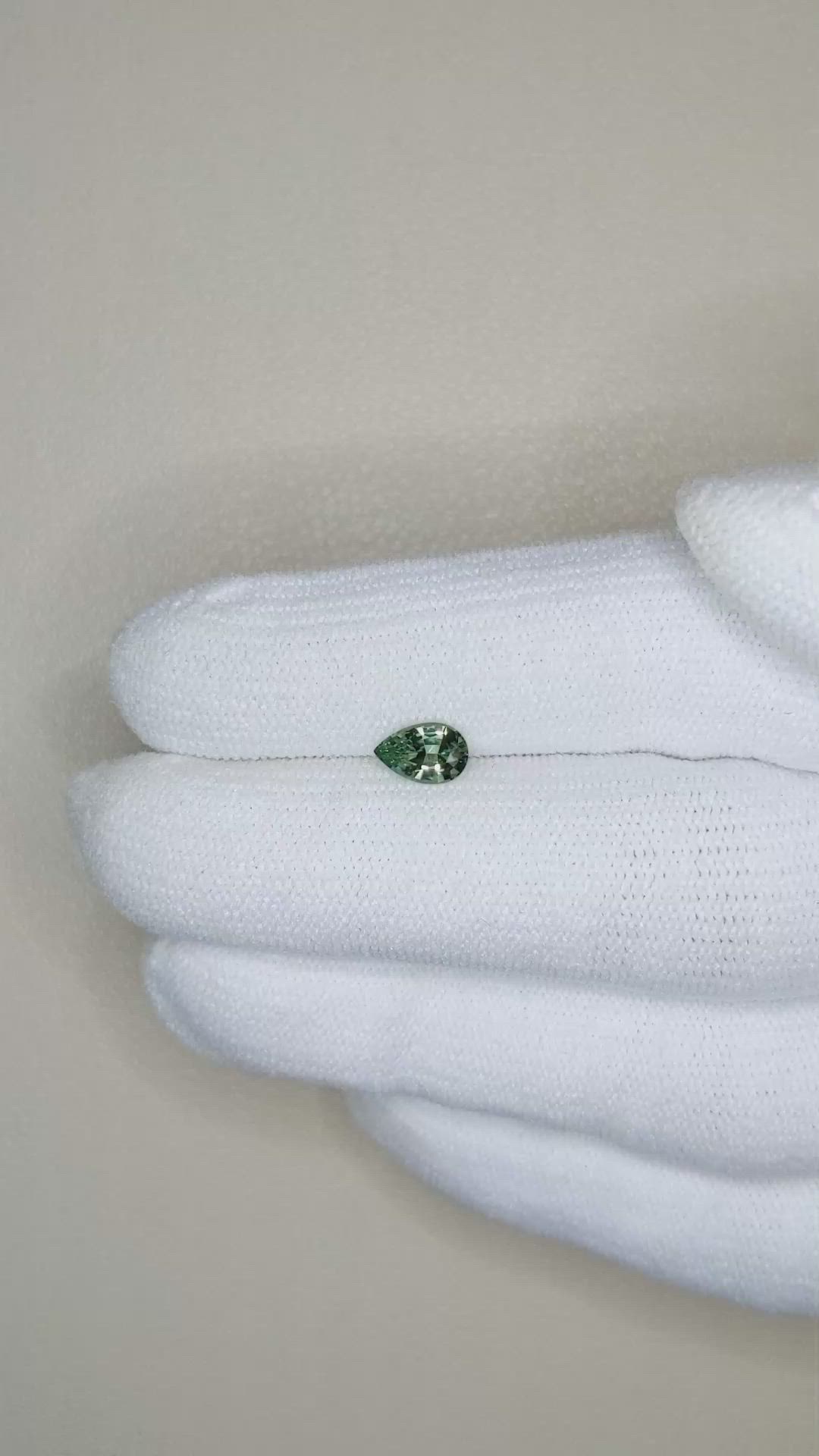 0.63 Ct. Yellowish Green Sapphire from Madagascar Size Video