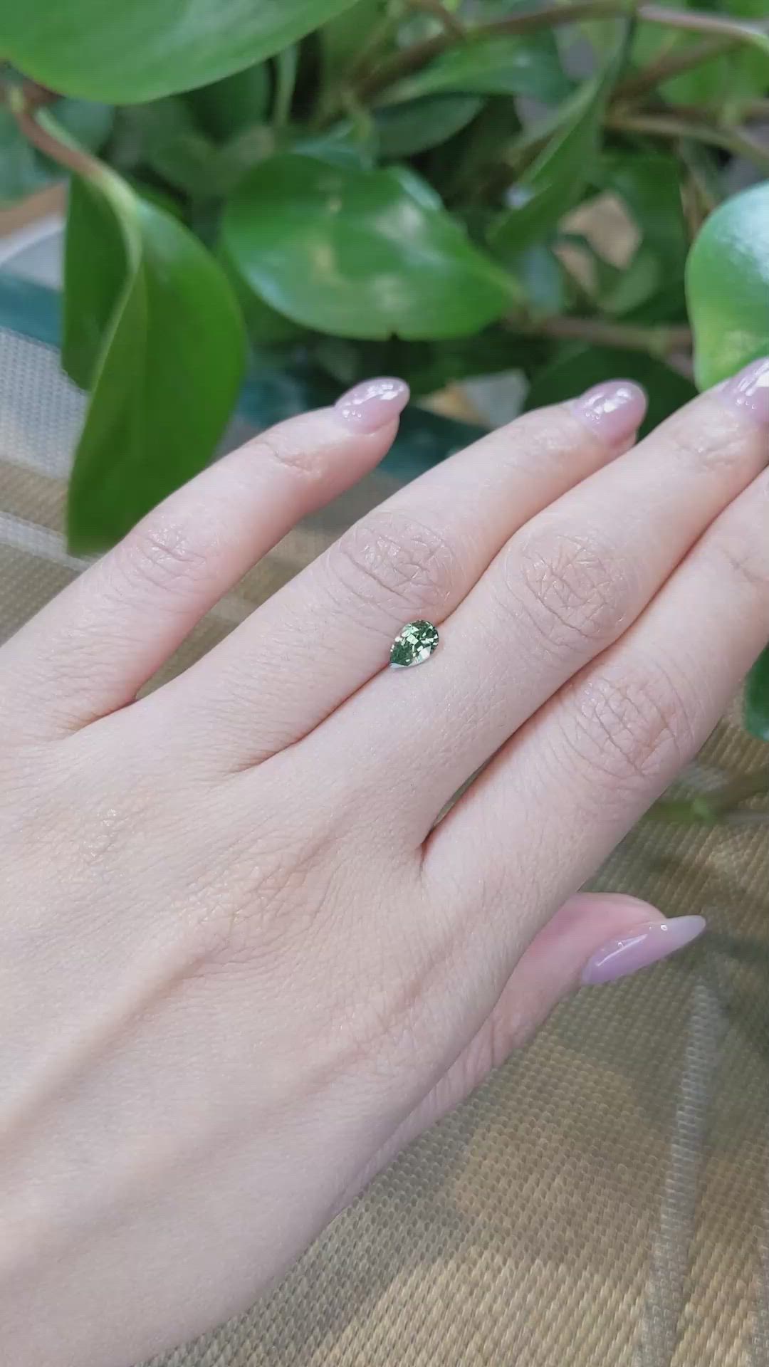 0.63 Ct. Yellowish Green Sapphire from Madagascar Size Video