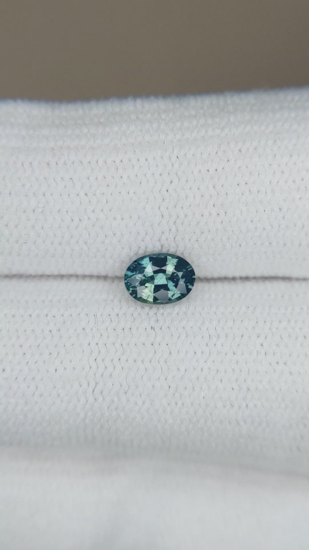 0.59 Ct. Bluish Green Sapphire from Madagascar Size Video