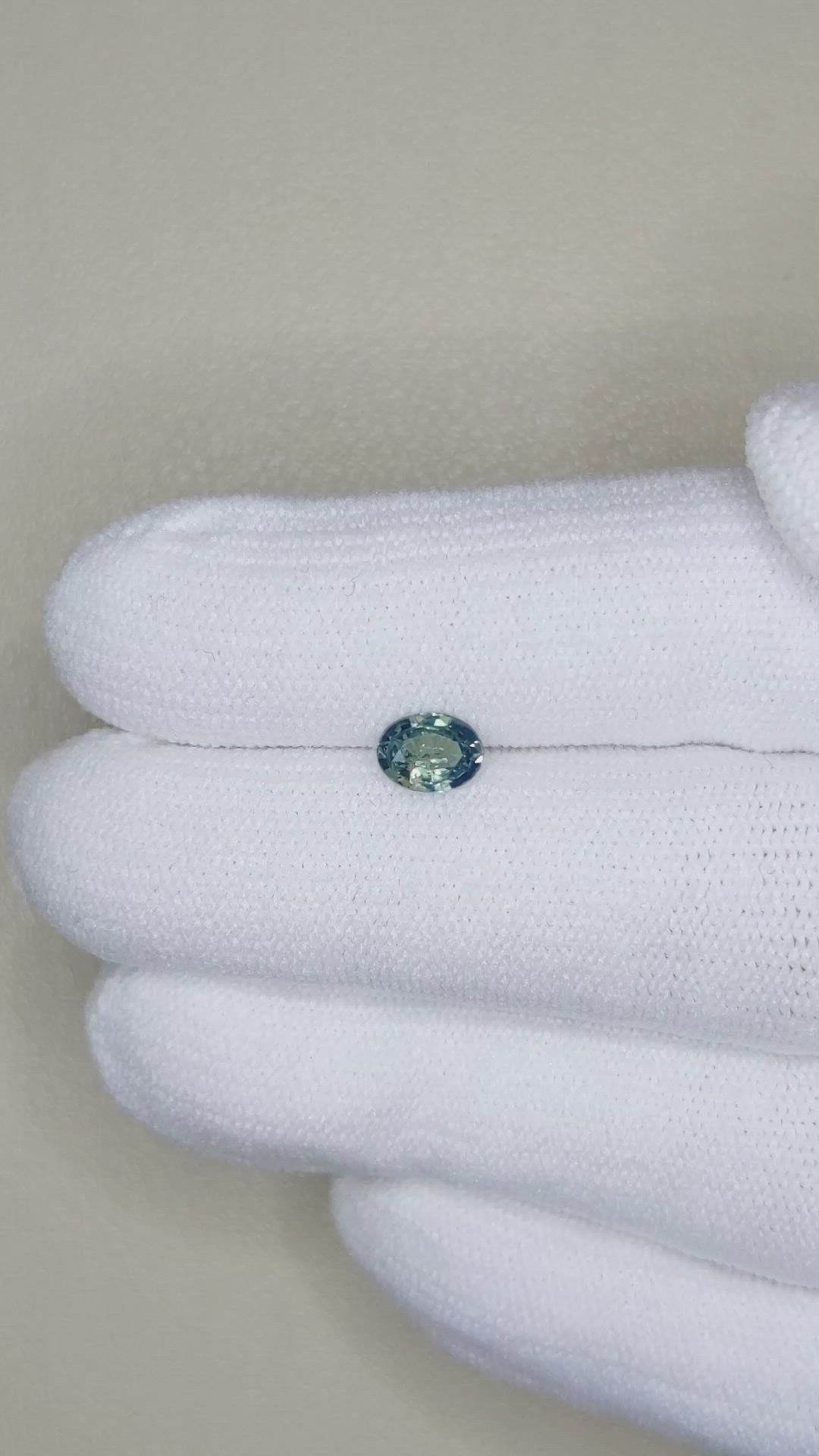 0.61 Ct. Bluish Green Sapphire from Madagascar Size Video