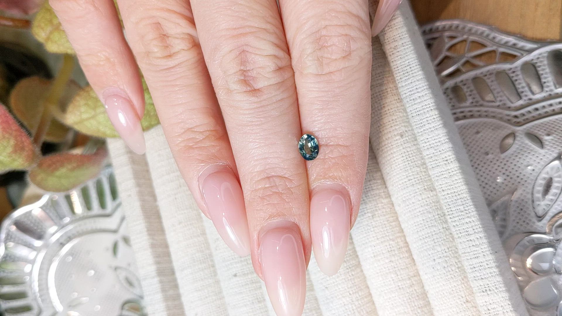 0.61 Ct. Bluish Green Sapphire from Madagascar Size Video