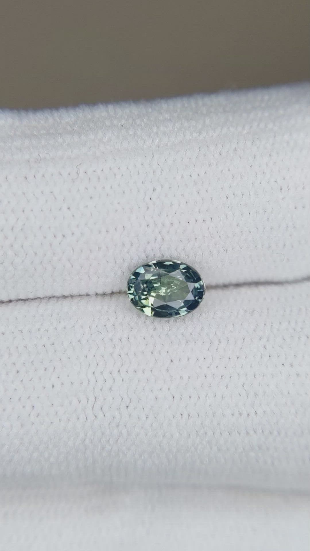 0.61 Ct. Bluish Green Sapphire from Madagascar Size Video