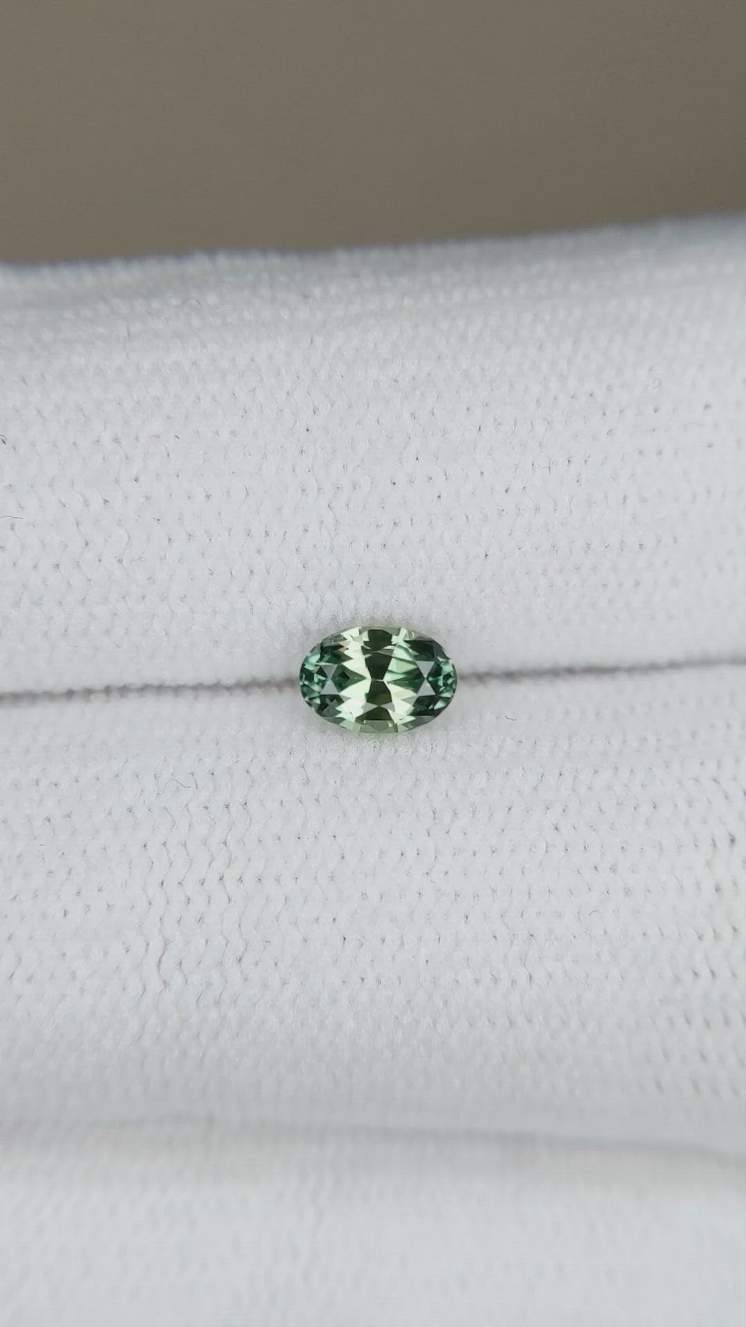 0.49 Ct. Bluish Green Sapphire from Madagascar Size Video