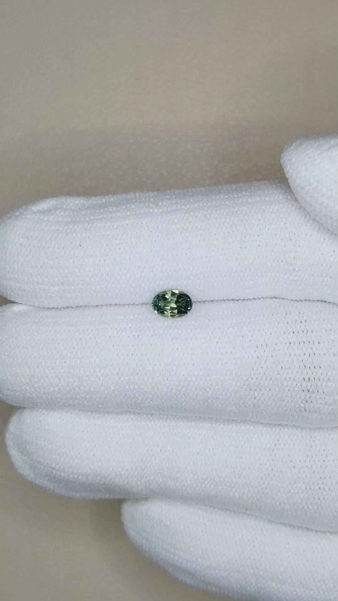 0.49 Ct. Bluish Green Sapphire from Madagascar Size Video