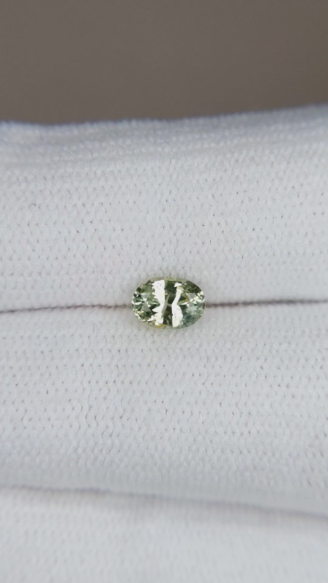 0.60 Ct. Yellowish Green Sapphire from Madagascar Size Video