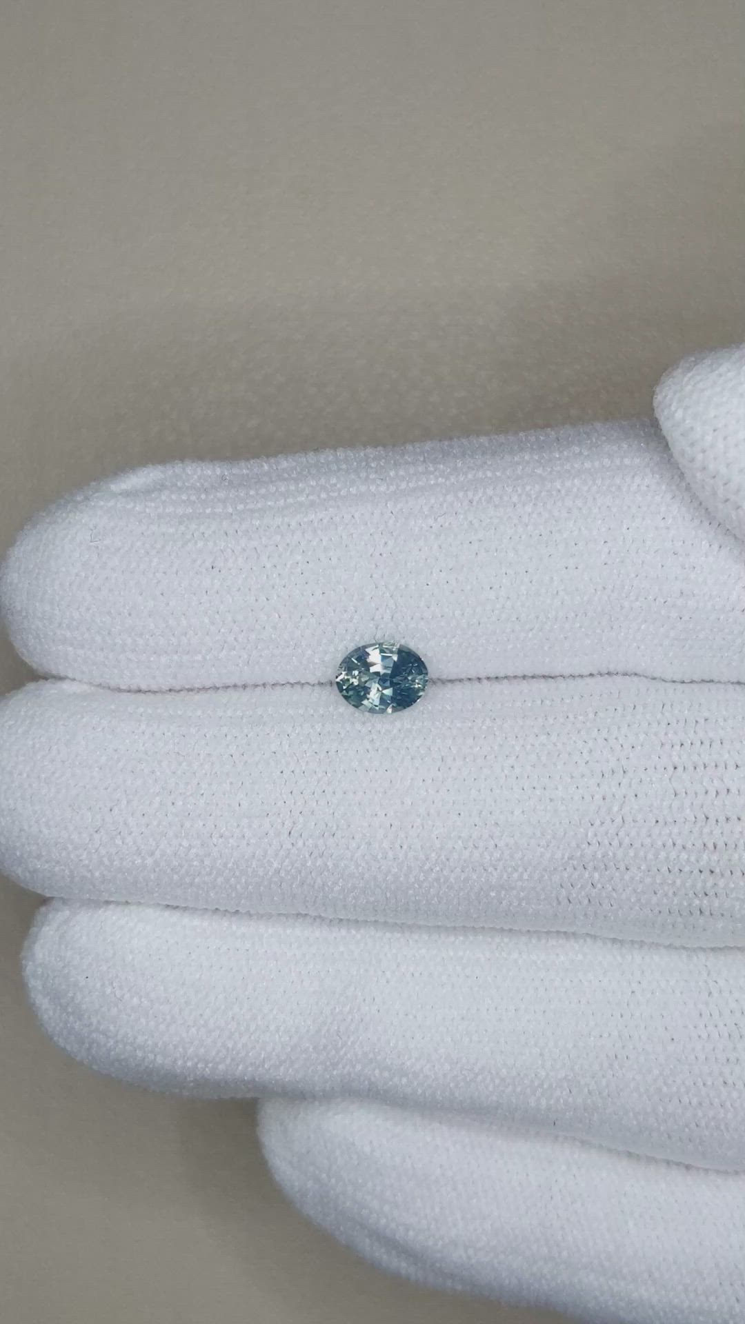 0.59 Ct. Greenish Blue Sapphire from Madagascar Size Video