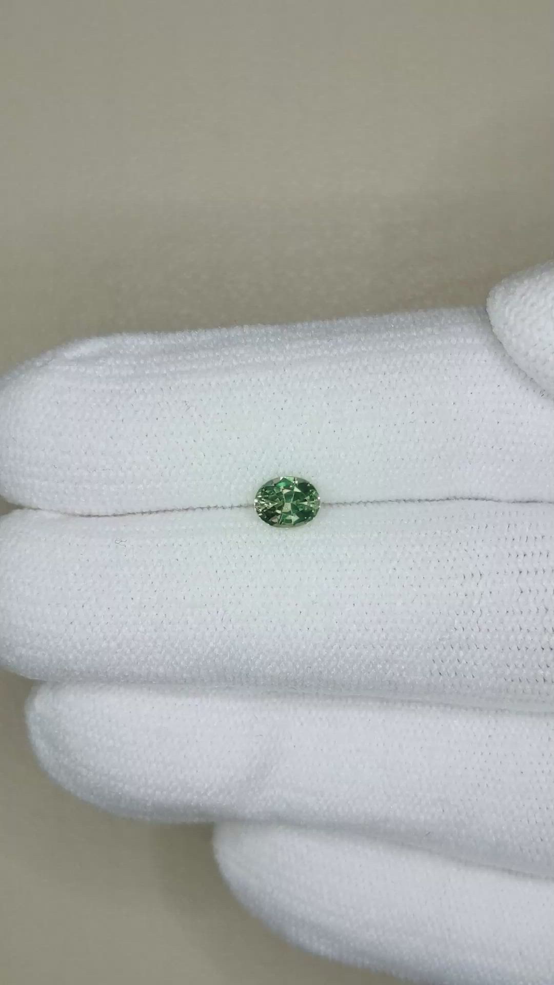 0.56 Ct. Bluish Green Sapphire from Madagascar Size Video