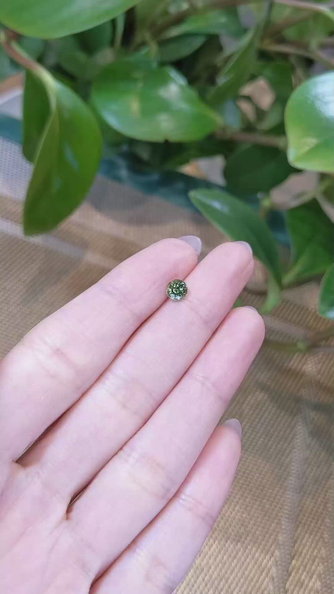 0.68 Ct. Yellowish Green Sapphire from Madagascar Size Video