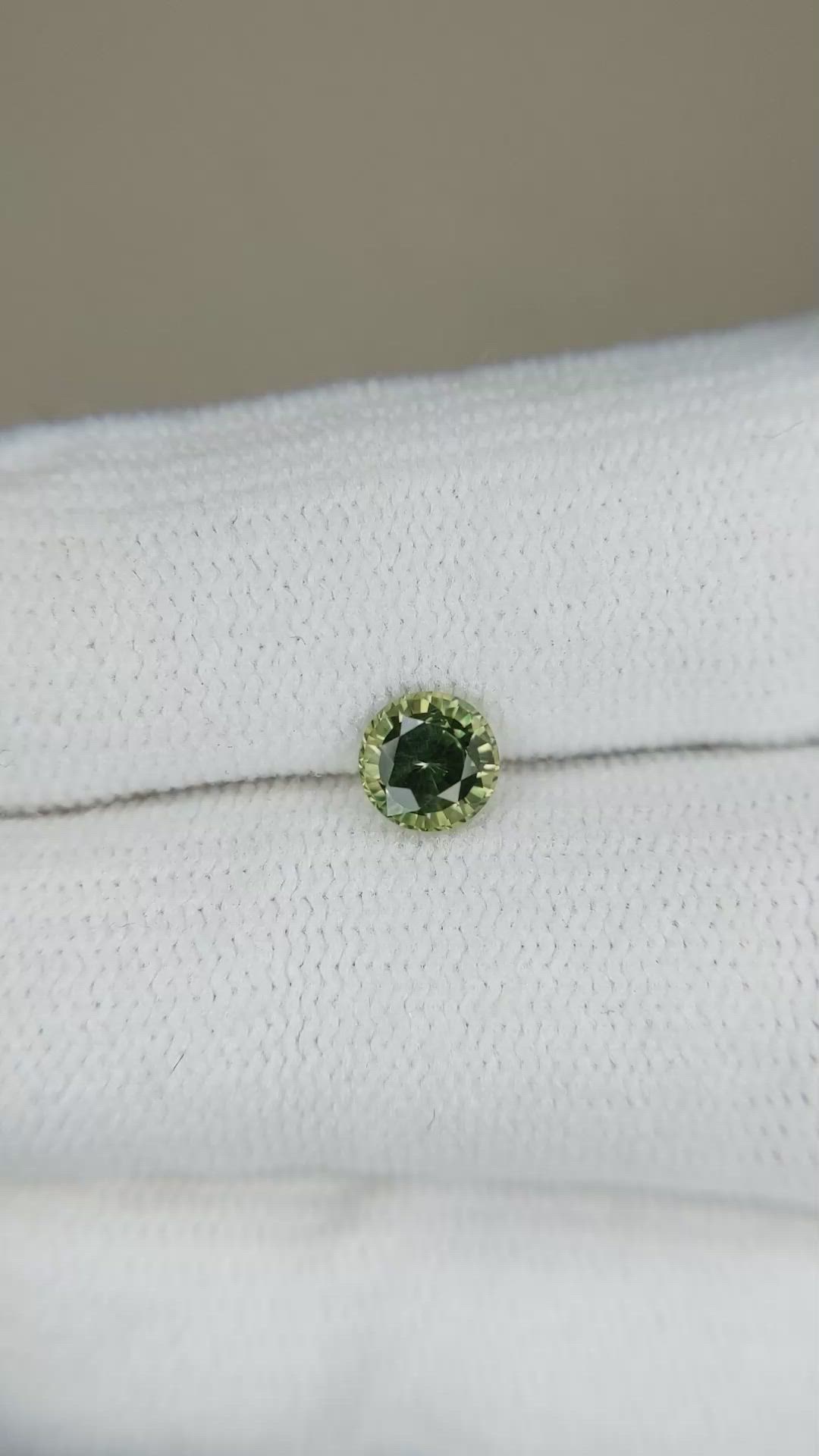 0.68 Ct. Yellowish Green Sapphire from Madagascar Size Video