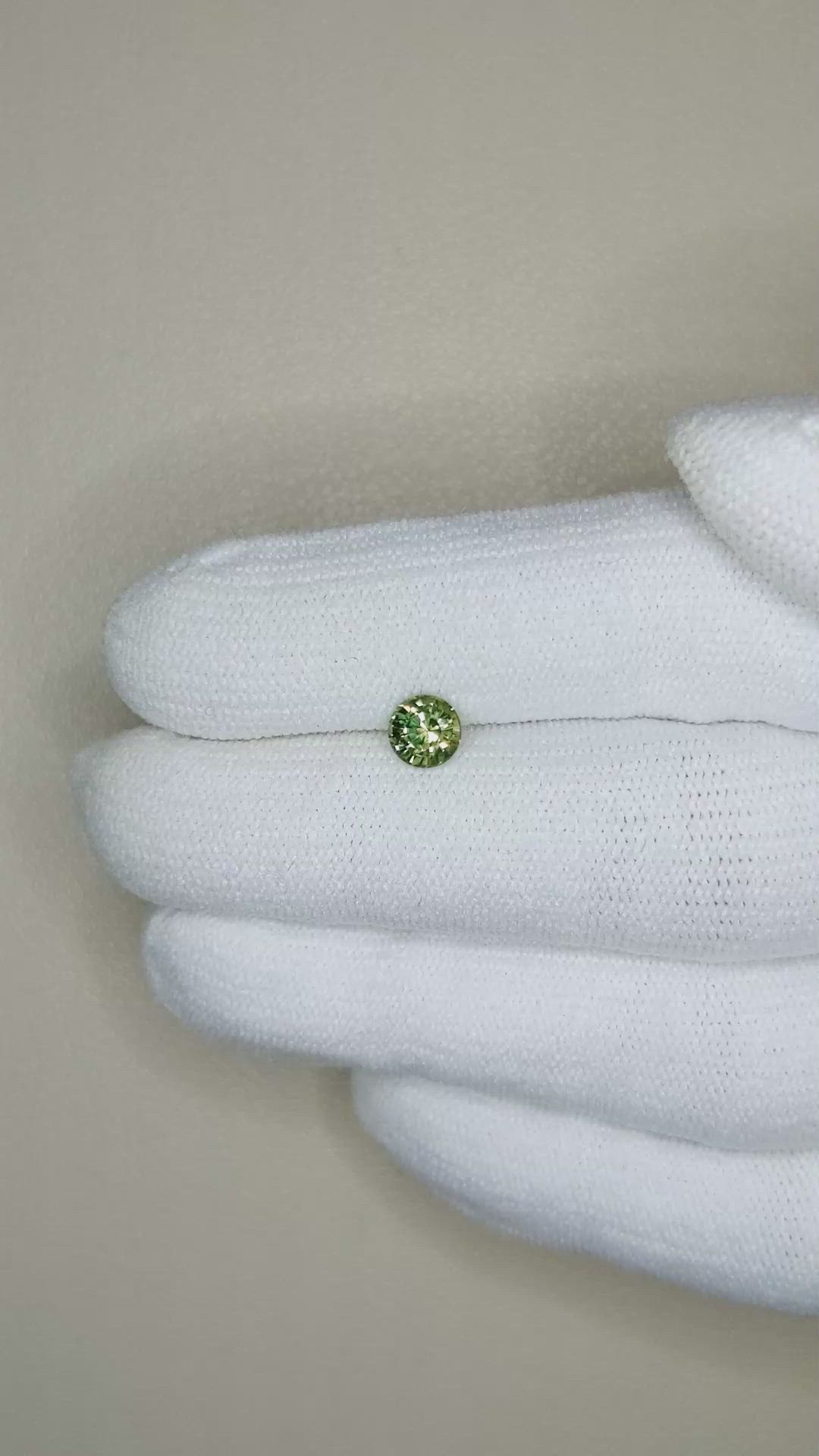 0.68 Ct. Yellowish Green Sapphire from Madagascar Size Video