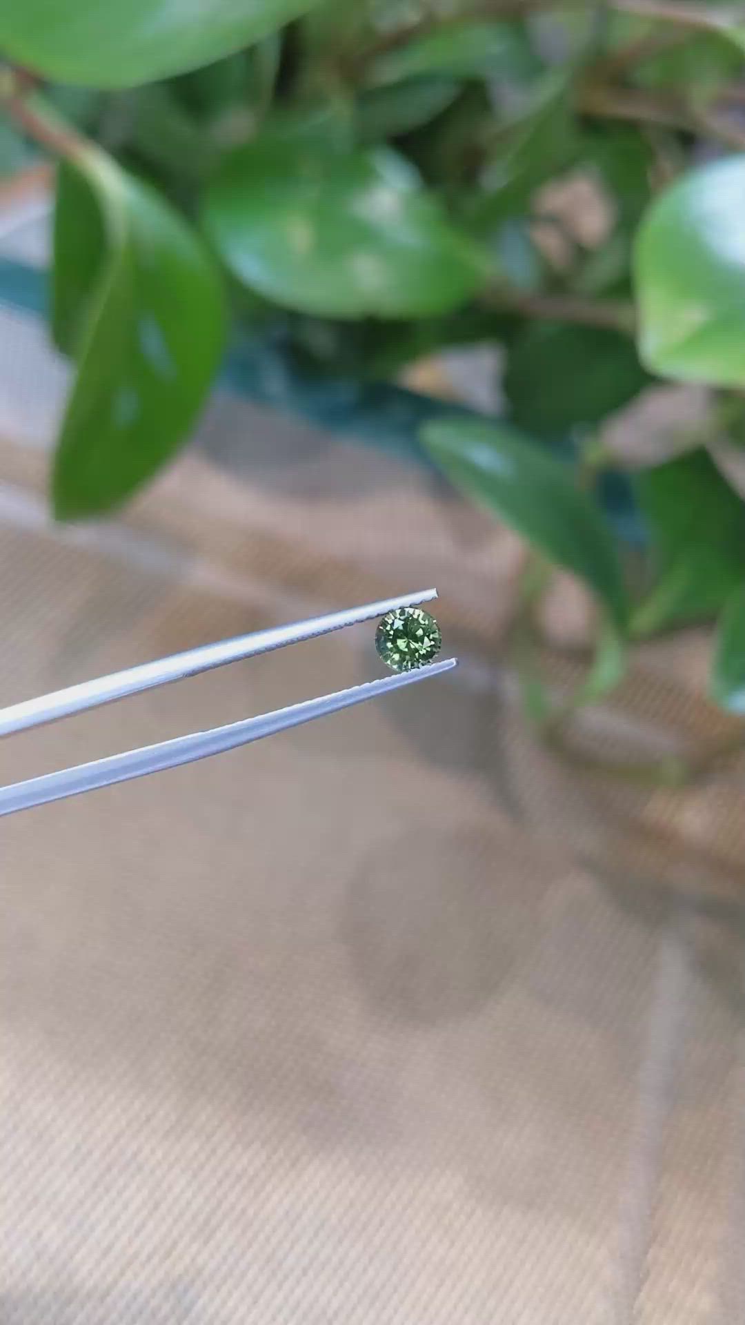 0.68 Ct. Yellowish Green Sapphire from Madagascar Size Video