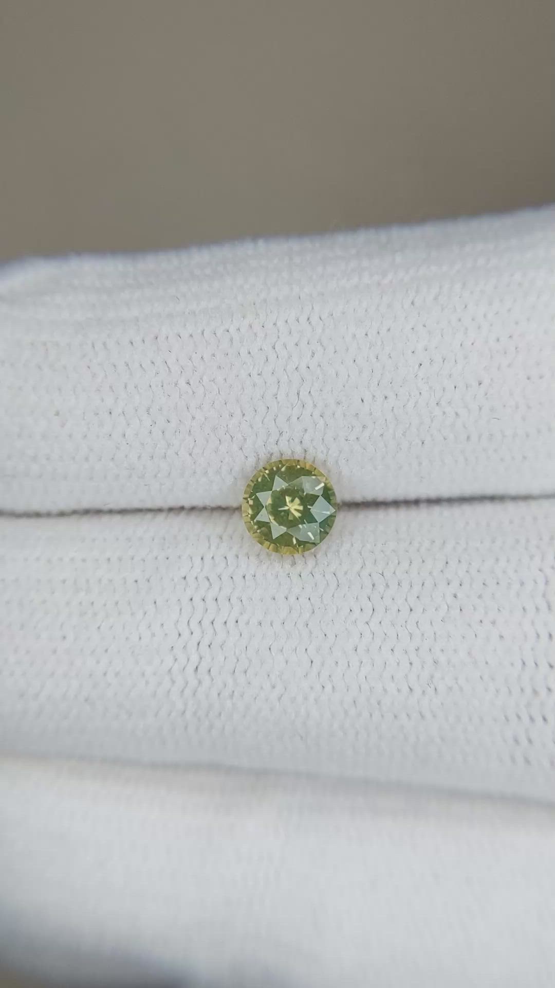 0.69 Ct. Yellowish Green Sapphire from Madagascar Size Video
