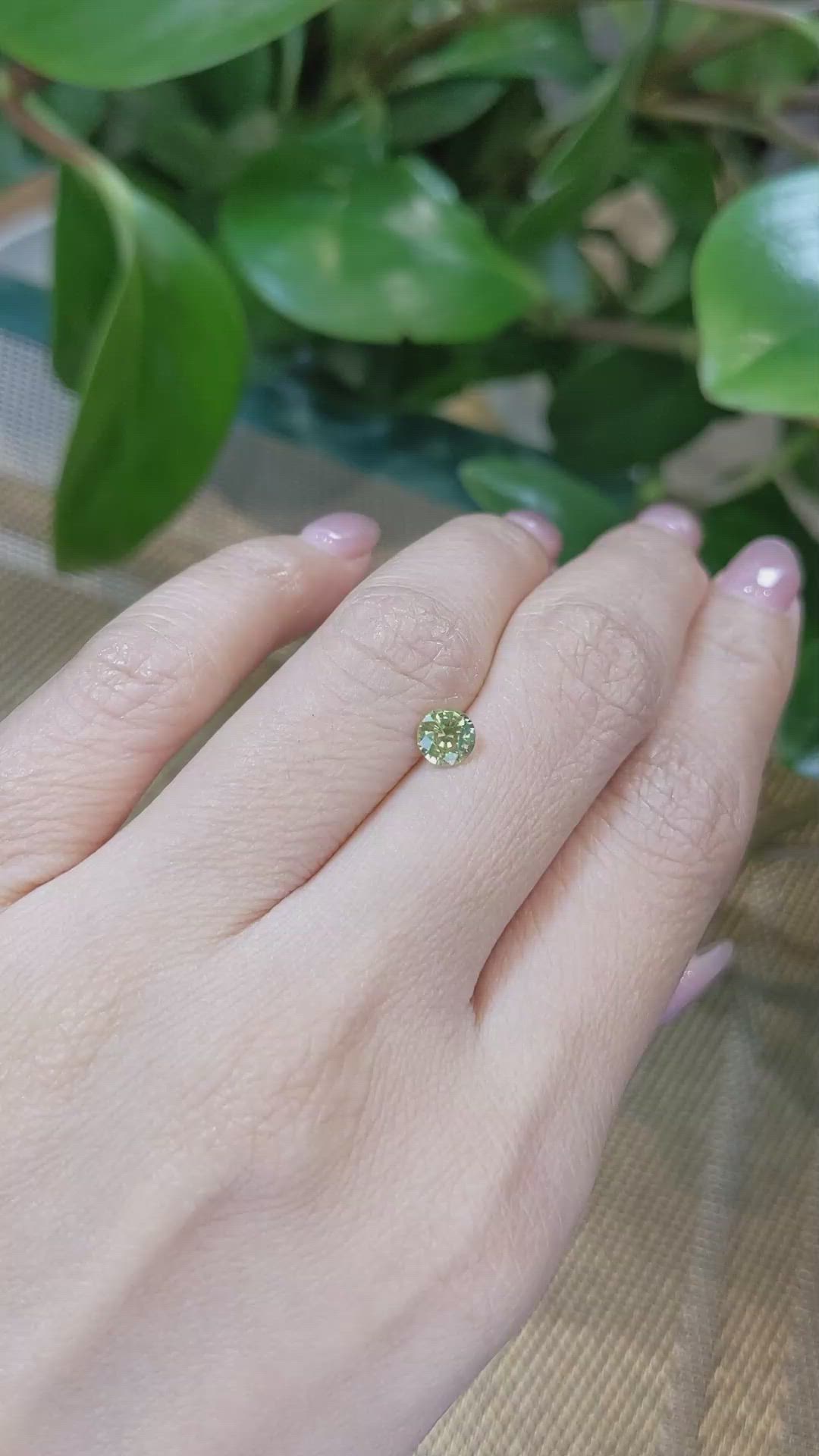 0.69 Ct. Yellowish Green Sapphire from Madagascar Size Video