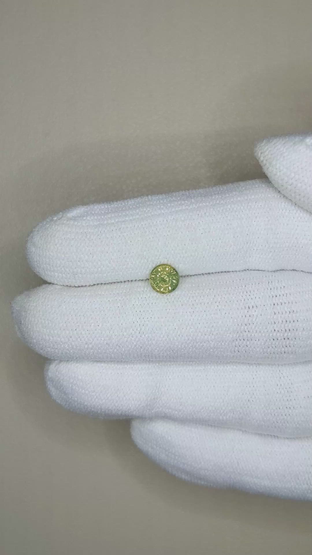 0.69 Ct. Yellowish Green Sapphire from Madagascar Size Video