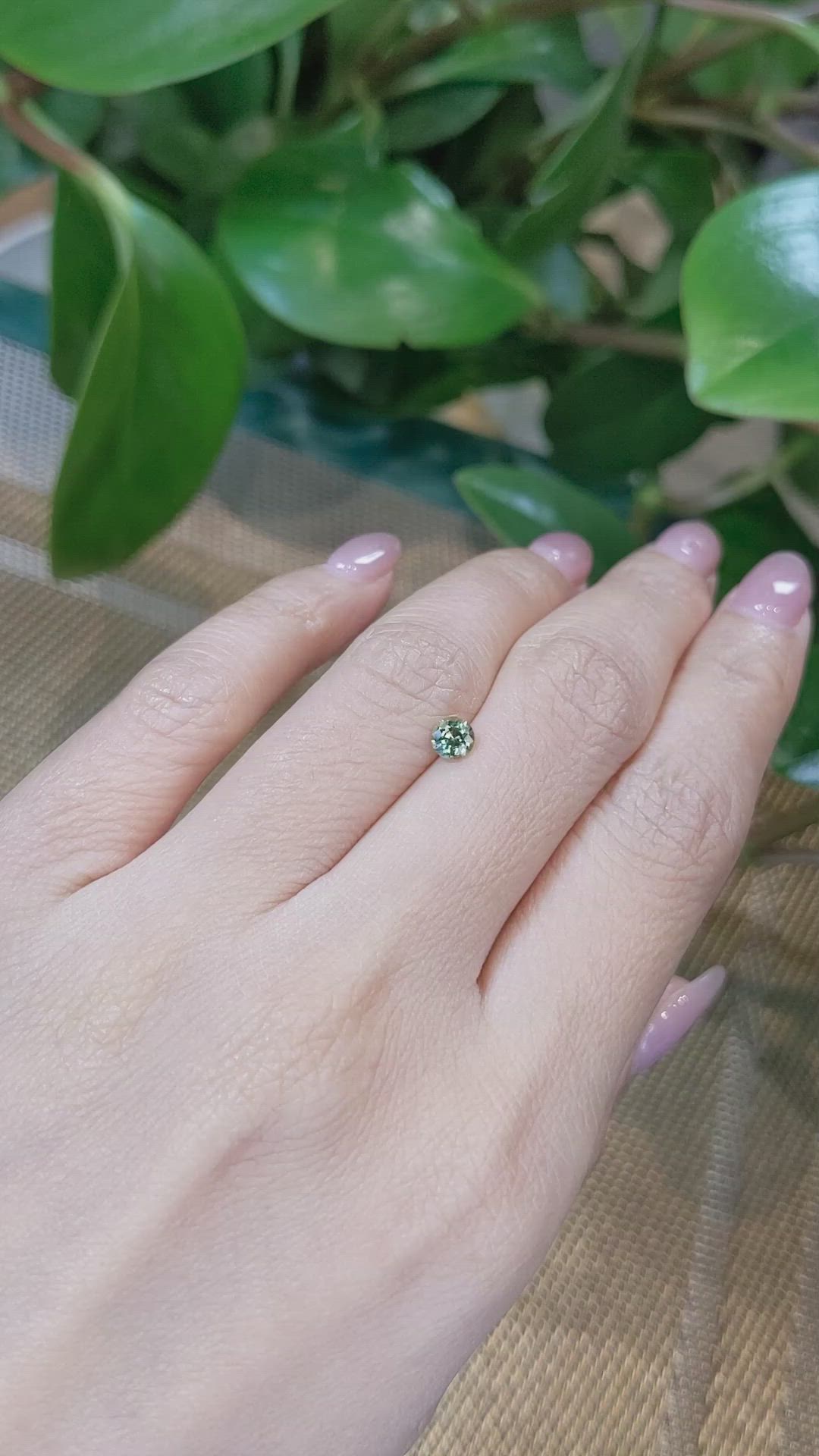 0.40 Ct. Yellowish Green Sapphire from Madagascar Size Video