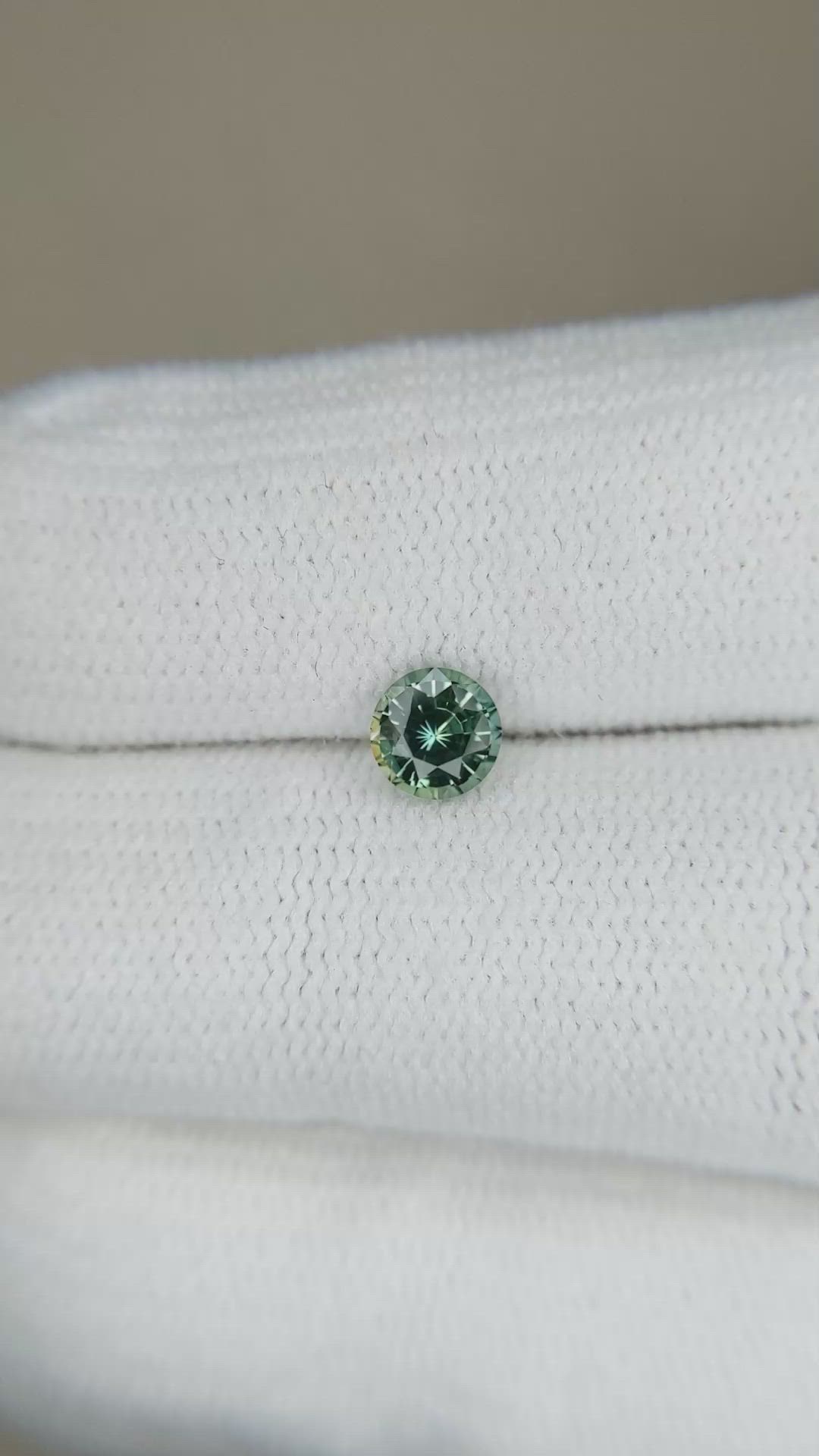 0.57 Ct. Bluish Green Sapphire from Madagascar Size Video