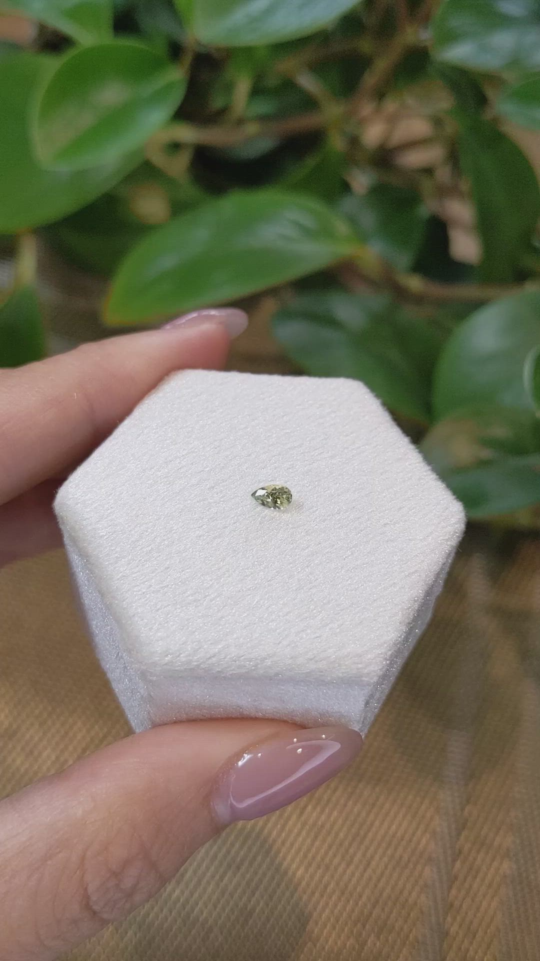 0.25 Ct. Yellowish Green Sapphire from Montana Size Video