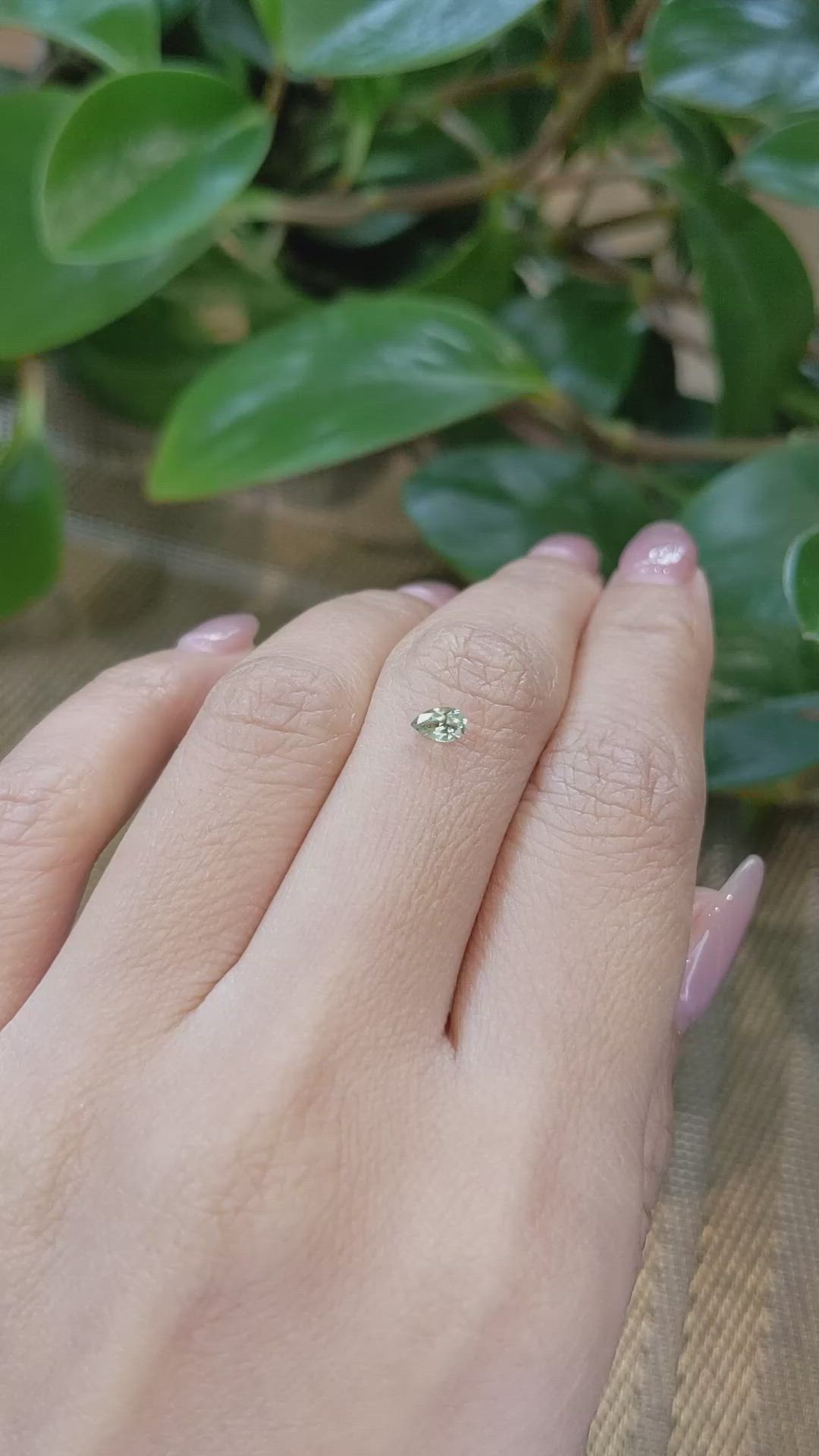 0.25 Ct. Yellowish Green Sapphire from Montana Size Video