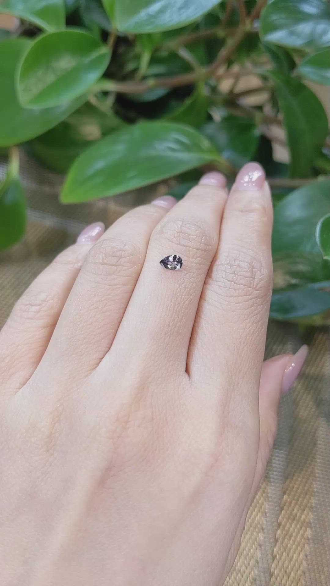 0.29 Ct. Pinkish Brown Sapphire from Montana Size Video