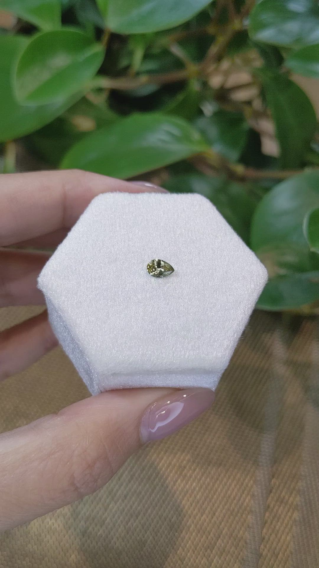 0.39 Ct. Yellowish Green Sapphire from Montana Size Video