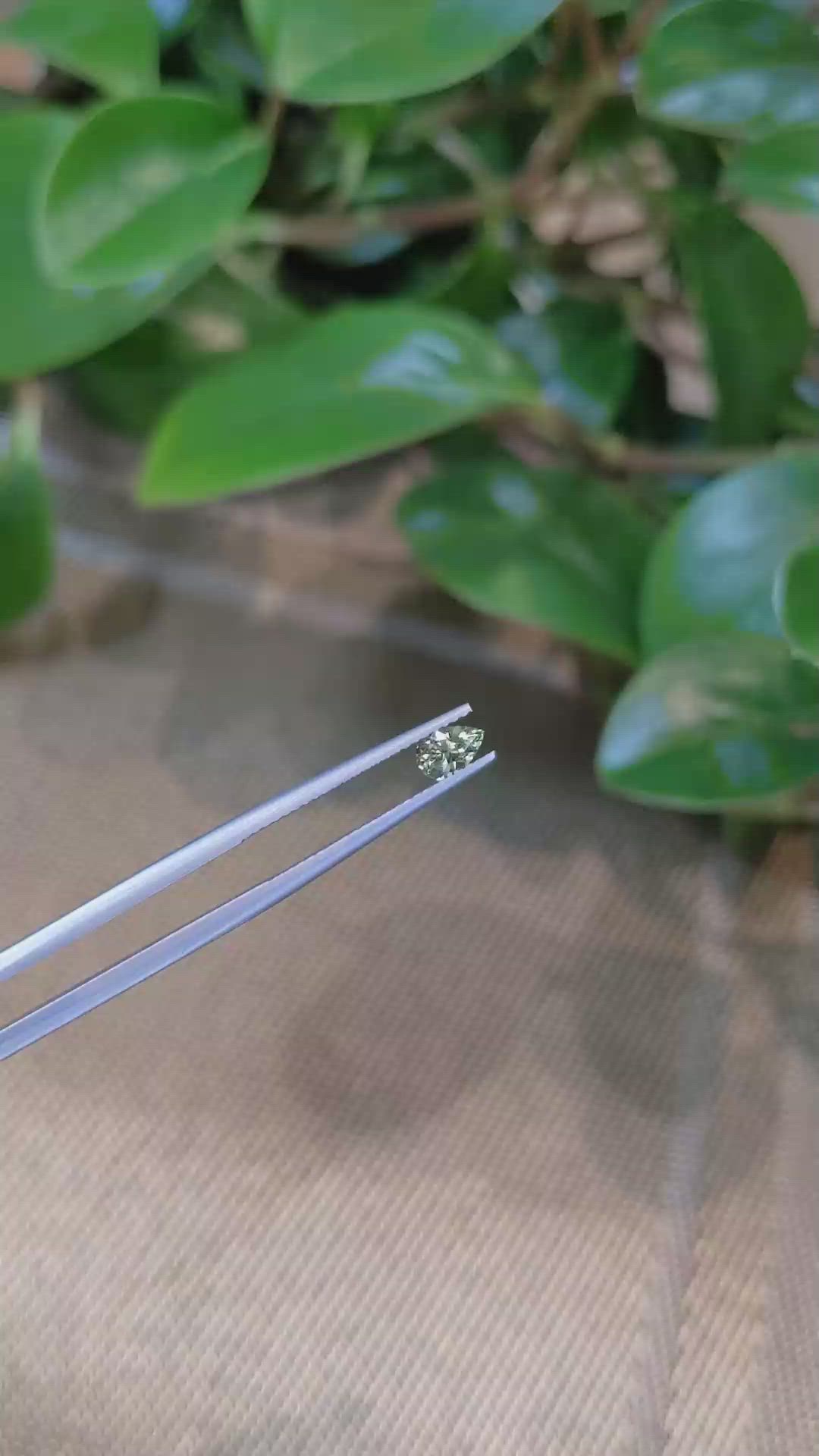 0.44 Ct. Yellowish Green Sapphire from Montana Size Video