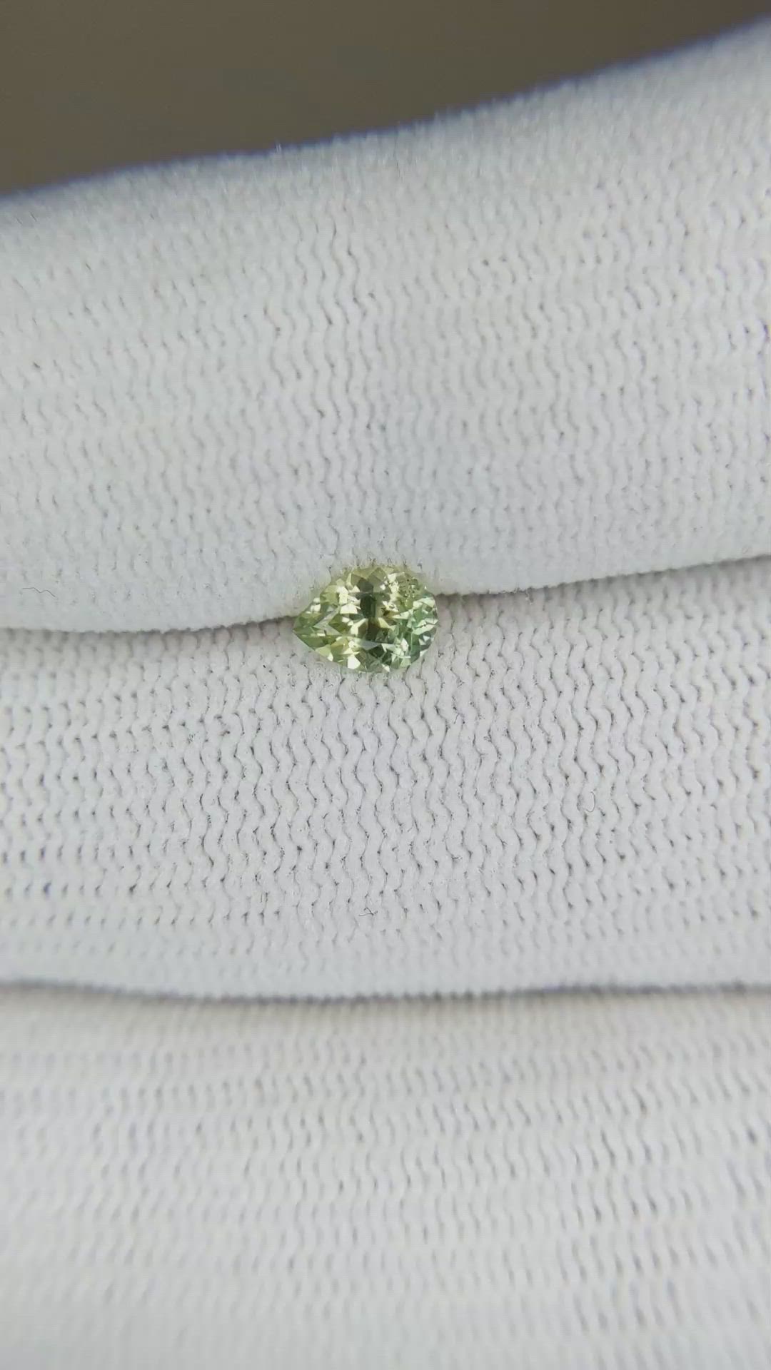 0.41 Ct. Yellowish Green Sapphire from Montana Size Video