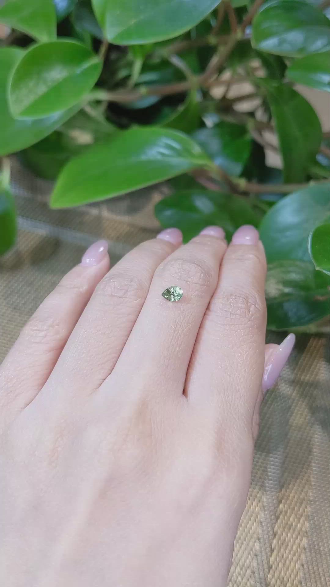 0.41 Ct. Yellowish Green Sapphire from Montana Size Video