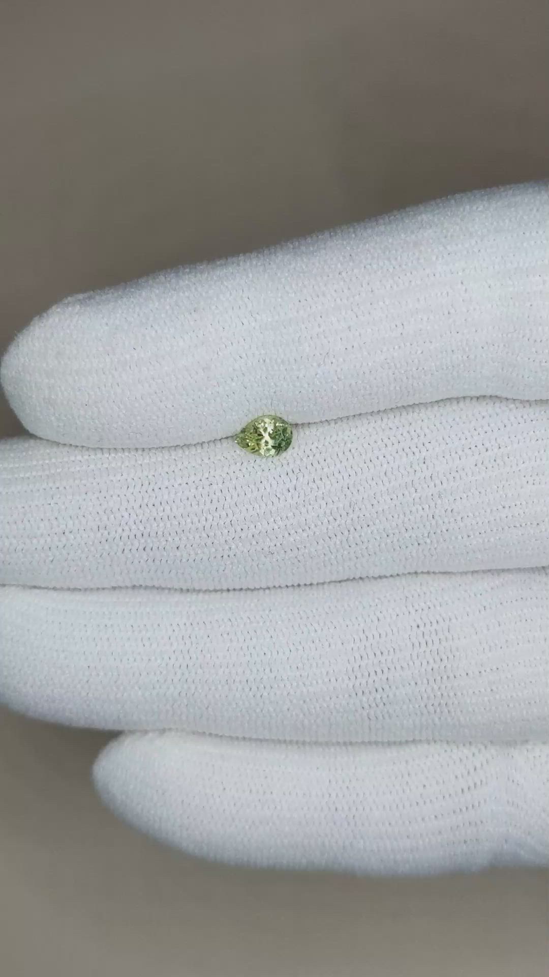 0.41 Ct. Yellowish Green Sapphire from Montana Size Video