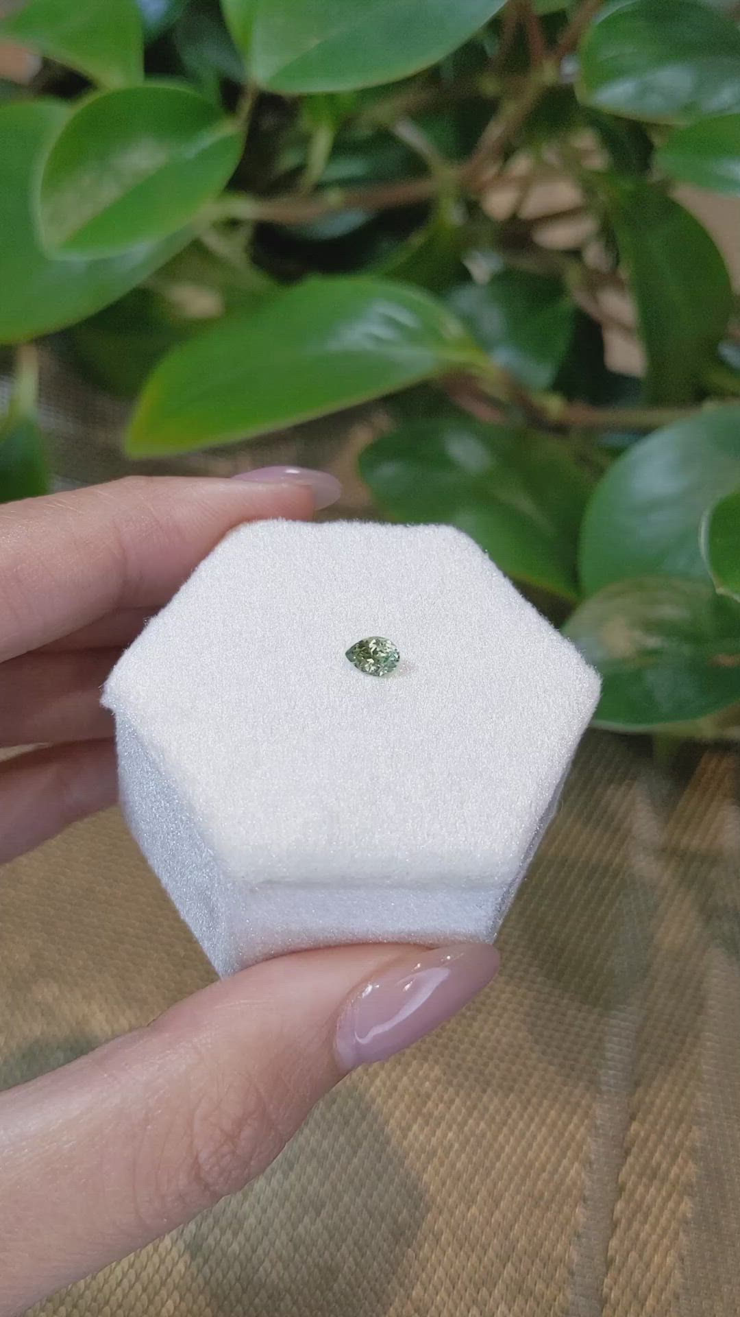 0.41 Ct. Yellowish Green Sapphire from Montana Size Video