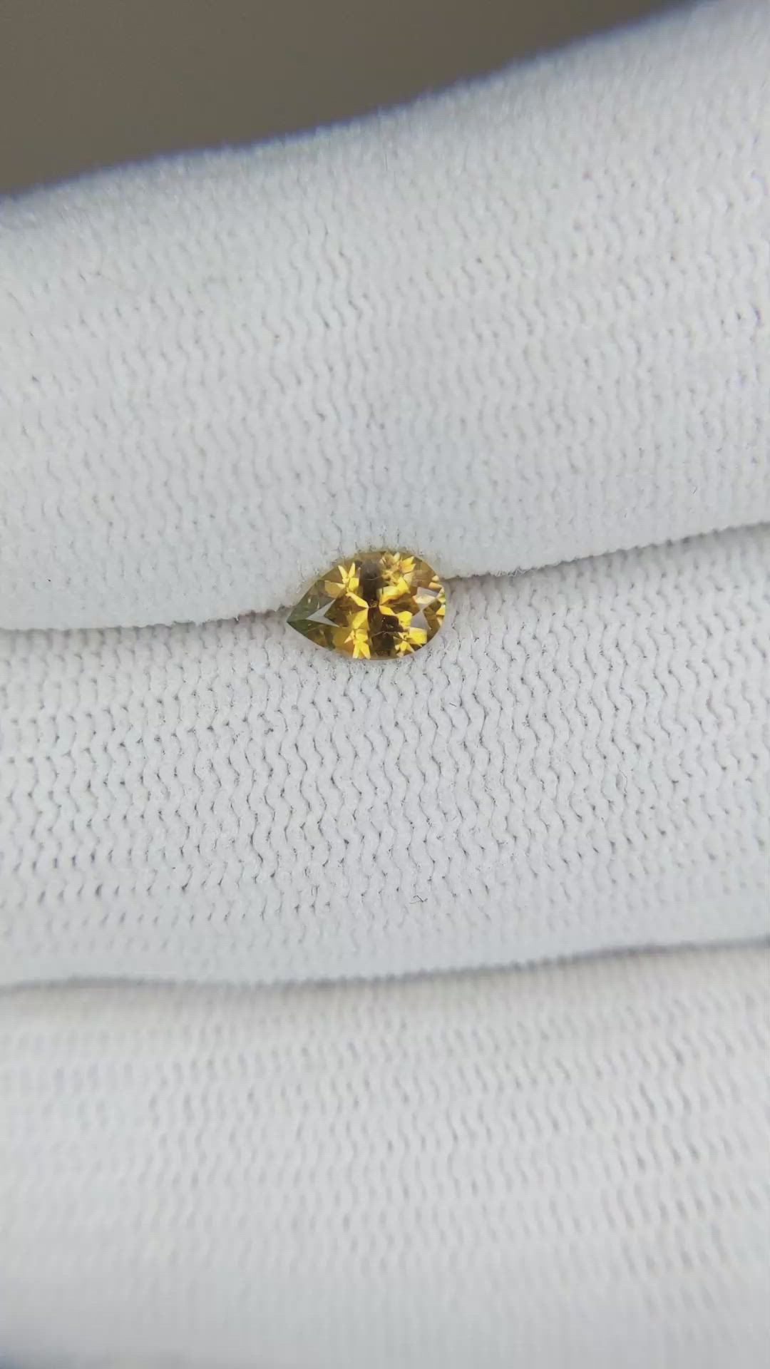 0.46 Ct. Greenish Yellow Sapphire from Montana Size Video