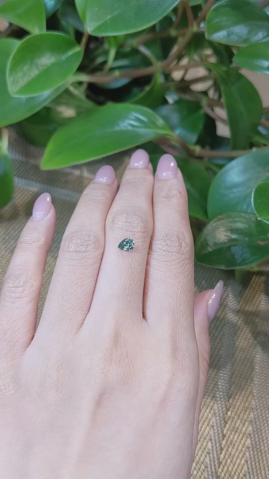 0.47 Ct. Bluish Green Sapphire from Montana Size Video