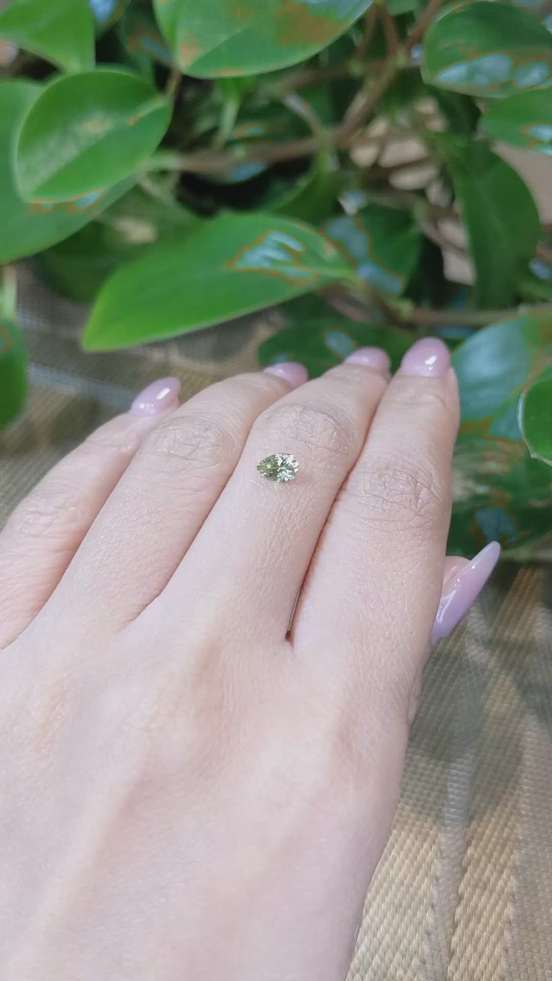 0.47 Ct. Greenish Yellow Sapphire from Montana Size Video