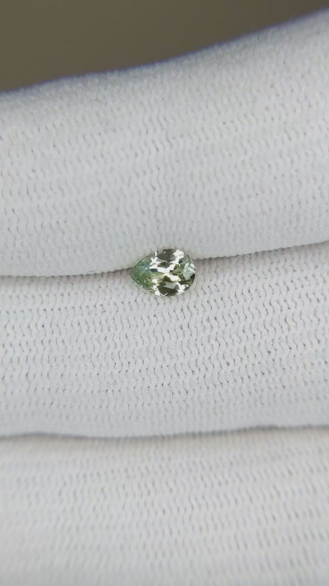 0.47 Ct. Greenish Yellow Sapphire from Montana Size Video