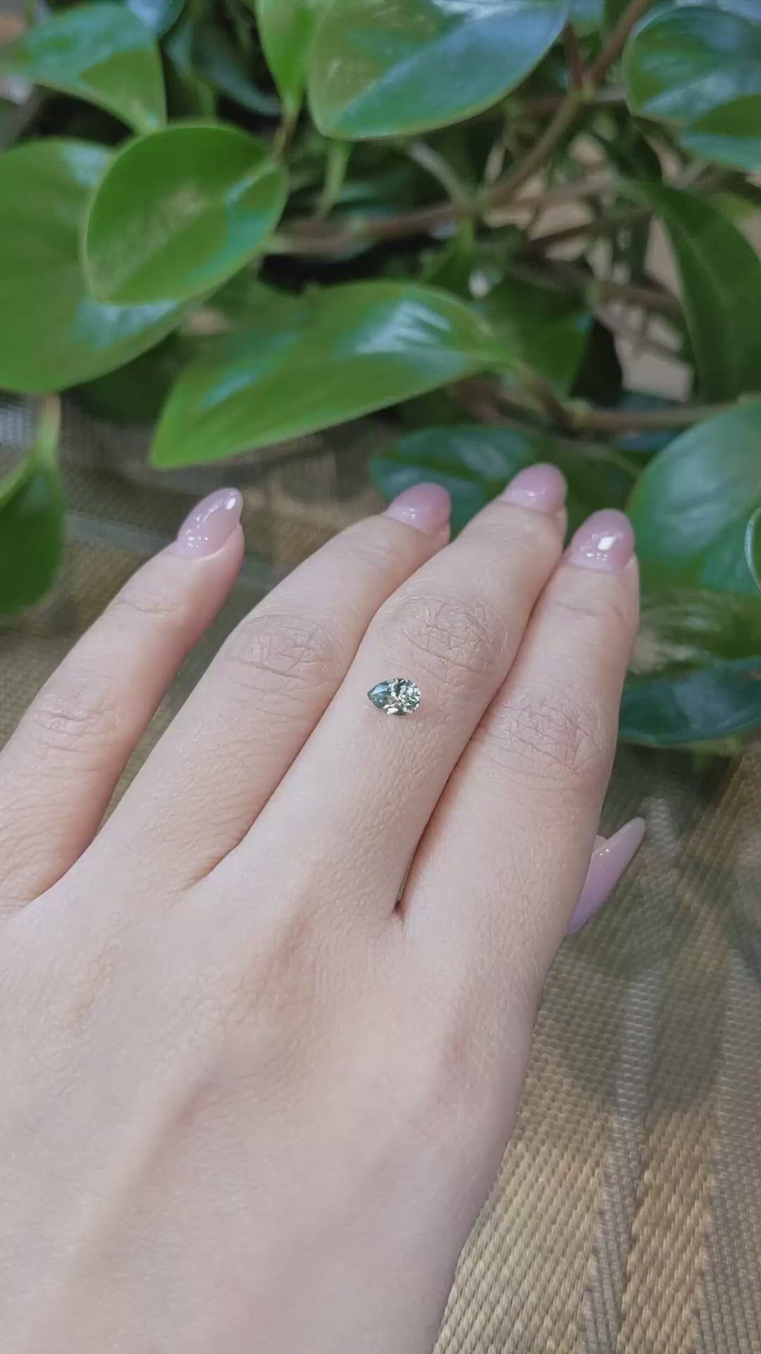 0.47 Ct. Greenish Yellow Sapphire from Montana Size Video