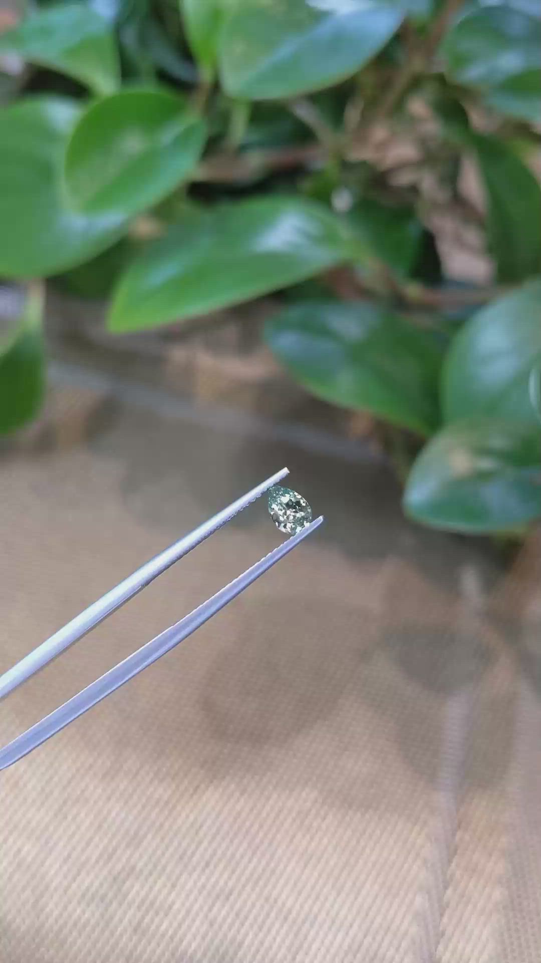 0.47 Ct. Greenish Yellow Sapphire from Montana Size Video