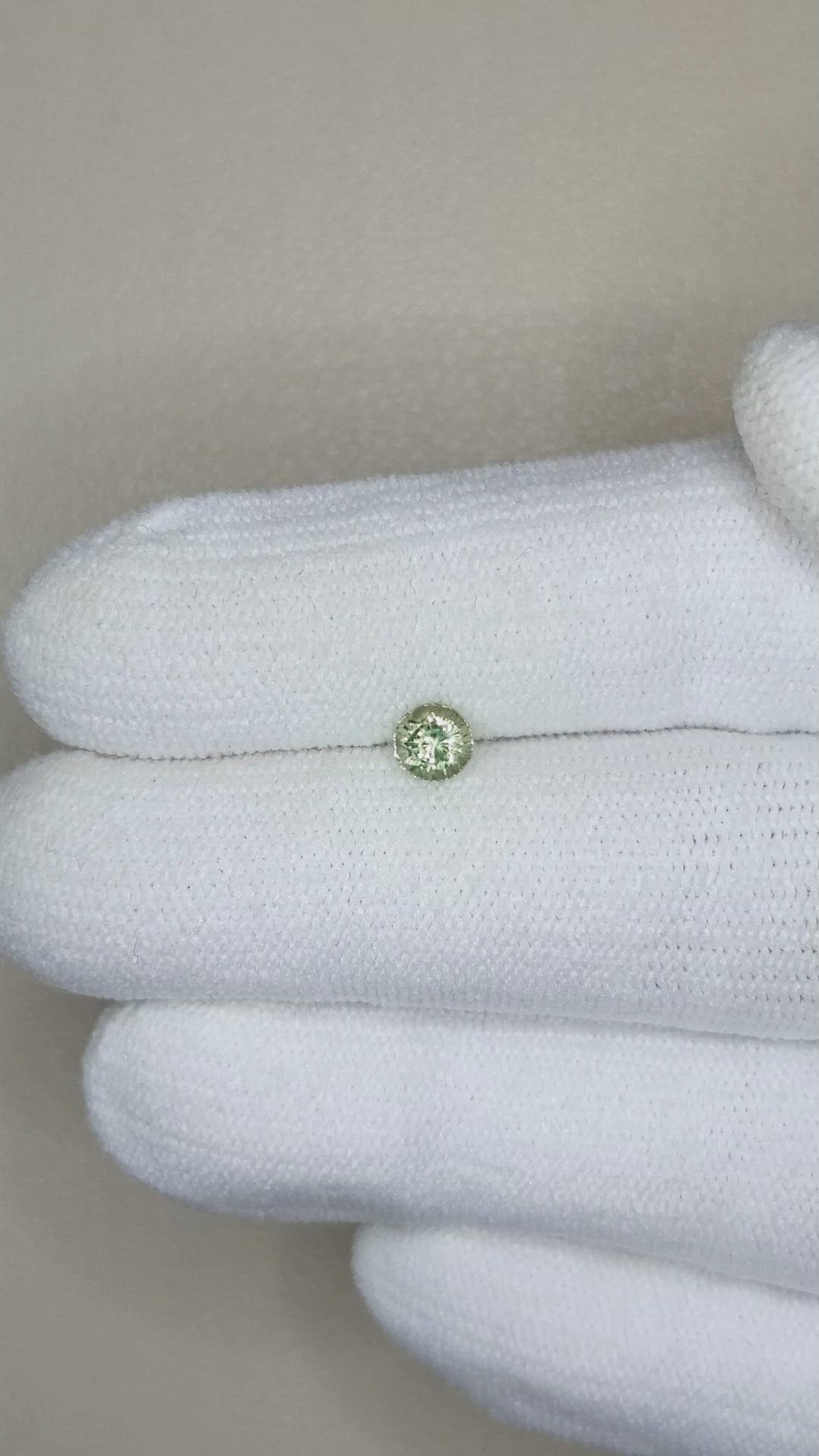 0.53 Ct. Yellowish Green Sapphire from Madagascar Size Video