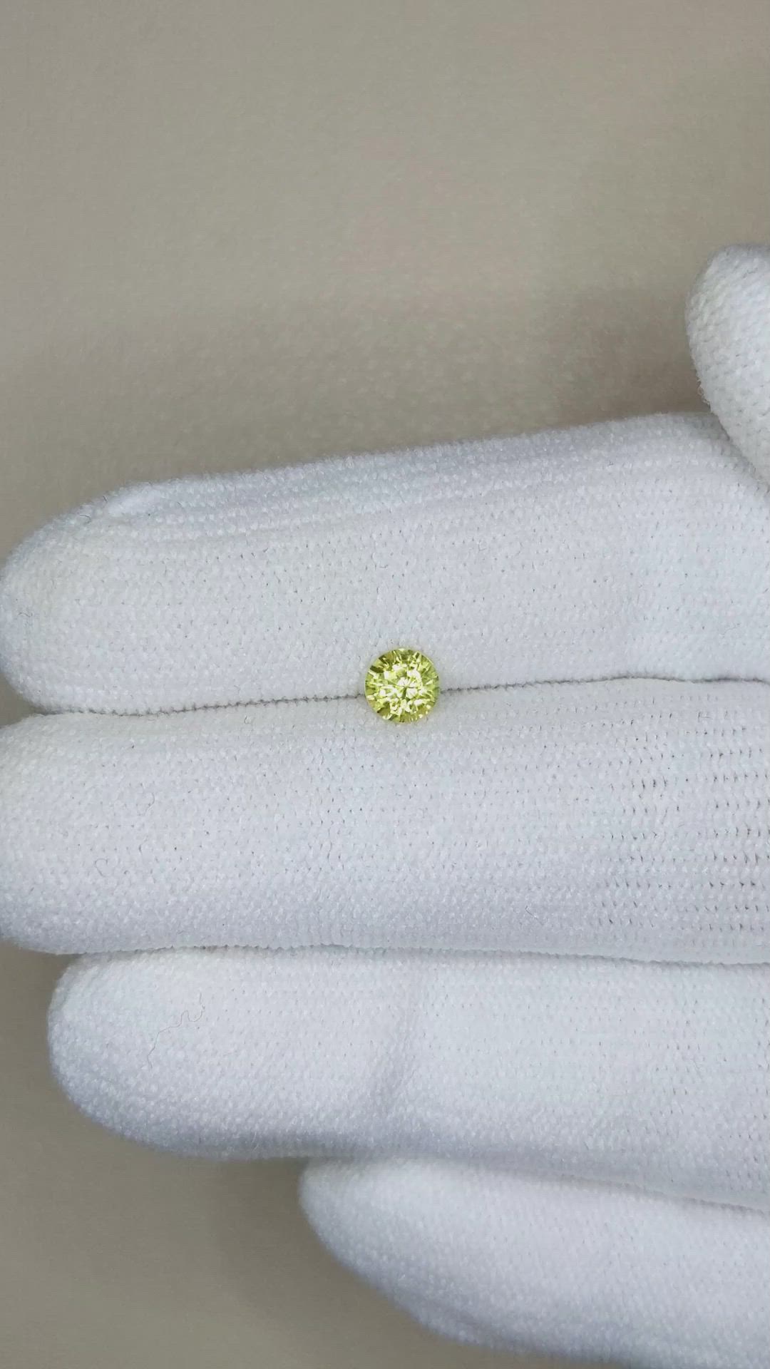 0.41 Ct. Greenish Yellow Sapphire from Madagascar Size Video