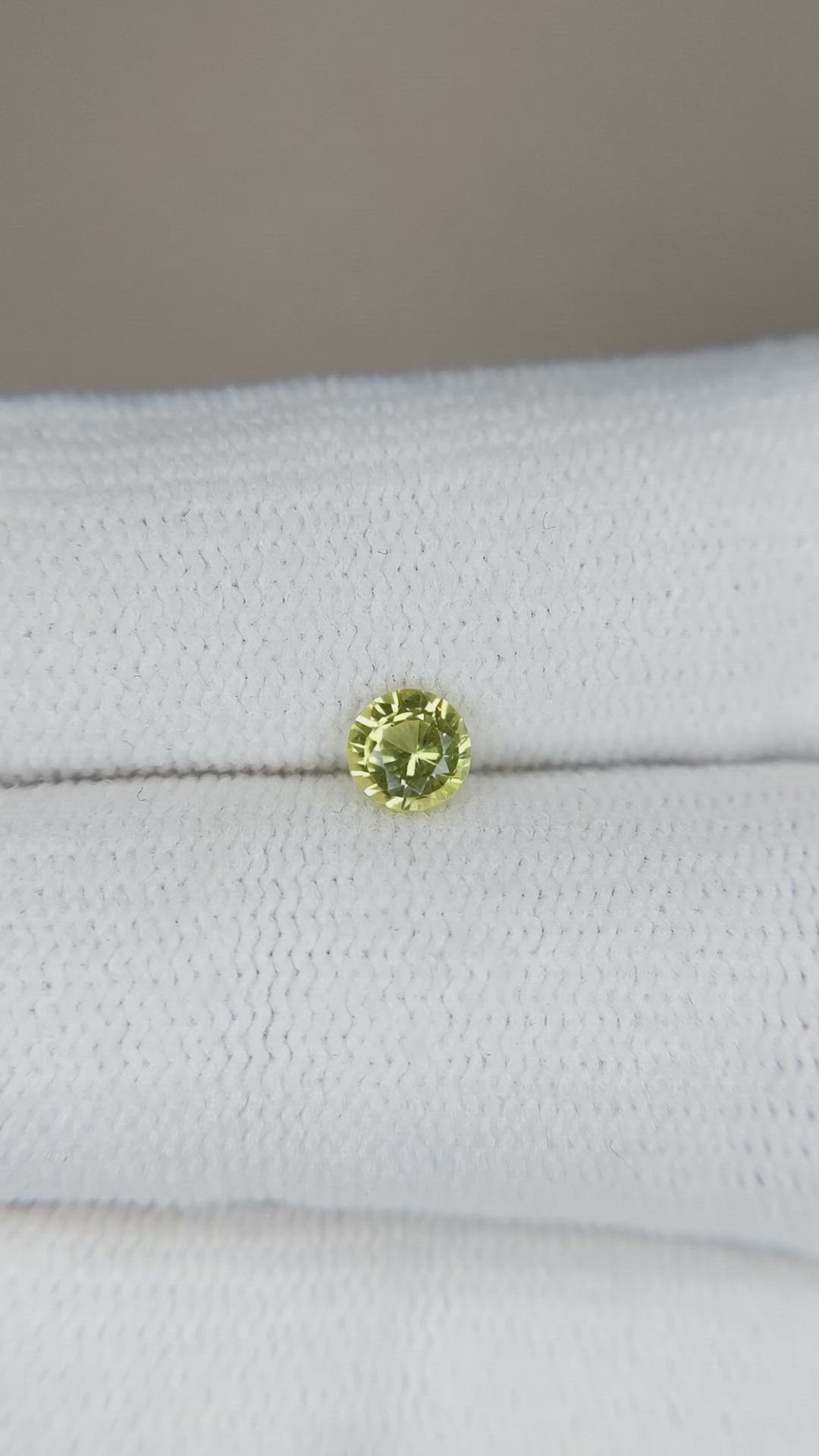 0.41 Ct. Greenish Yellow Sapphire from Madagascar Size Video