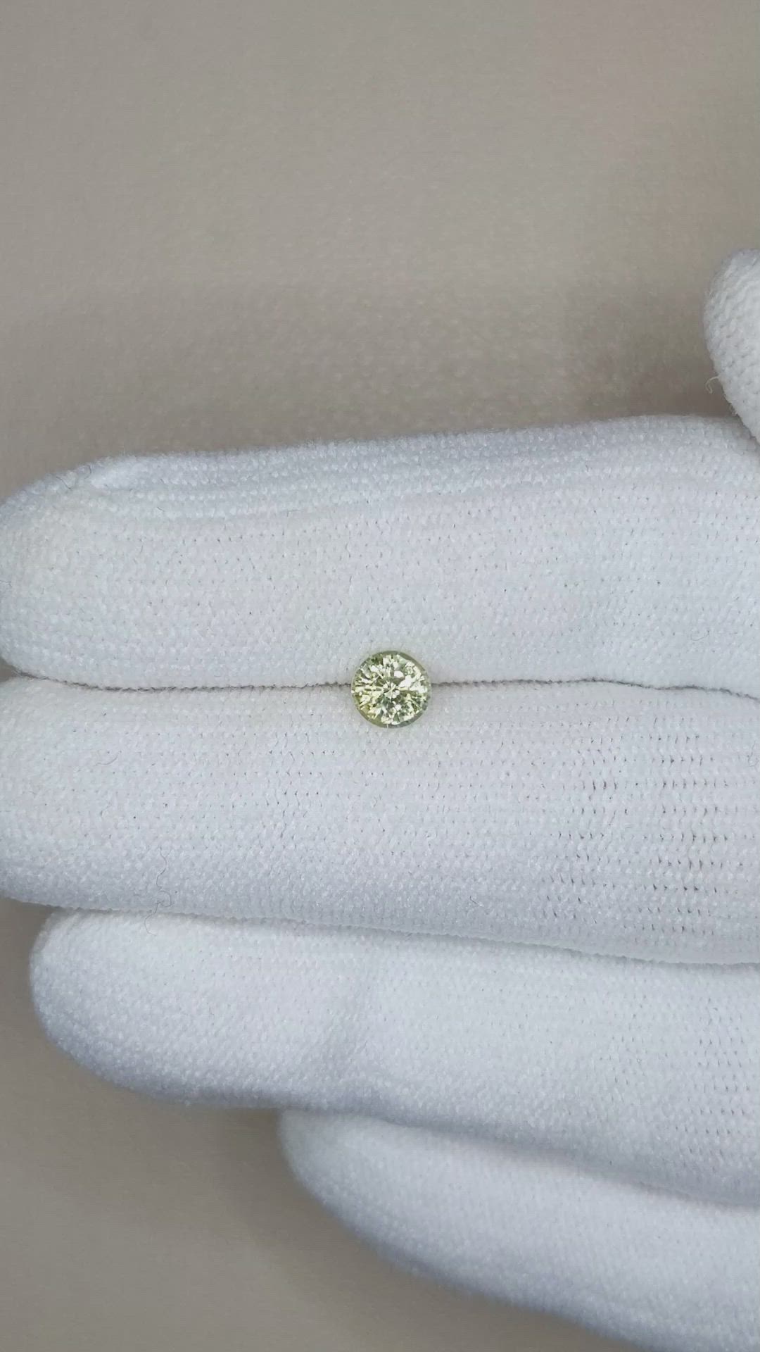 0.56 Ct. Greenish Yellow Sapphire from Madagascar Size Video