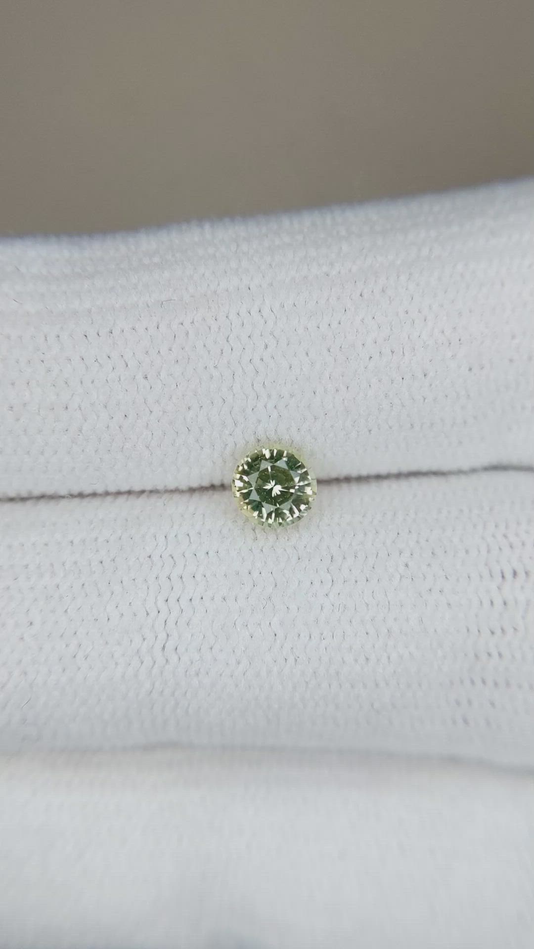 0.56 Ct. Greenish Yellow Sapphire from Madagascar Size Video