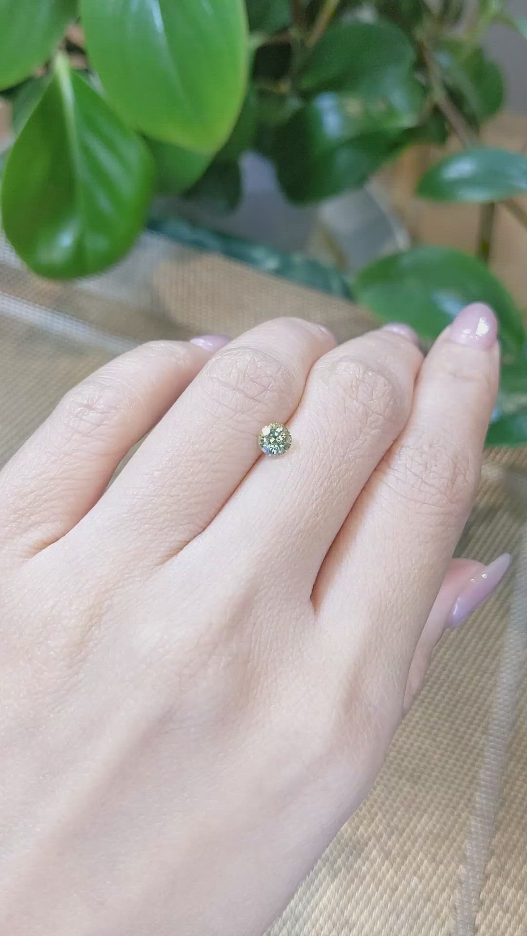 0.67 Ct. Yellowish Green Sapphire from Madagascar Size Video