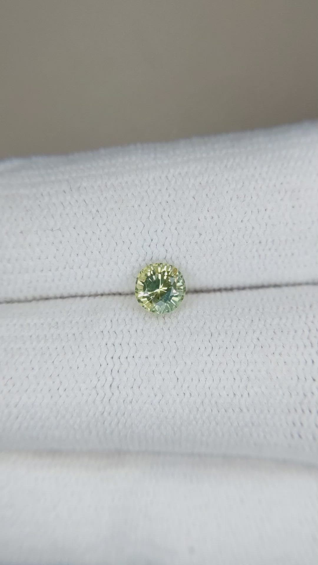 0.67 Ct. Yellowish Green Sapphire from Madagascar Size Video