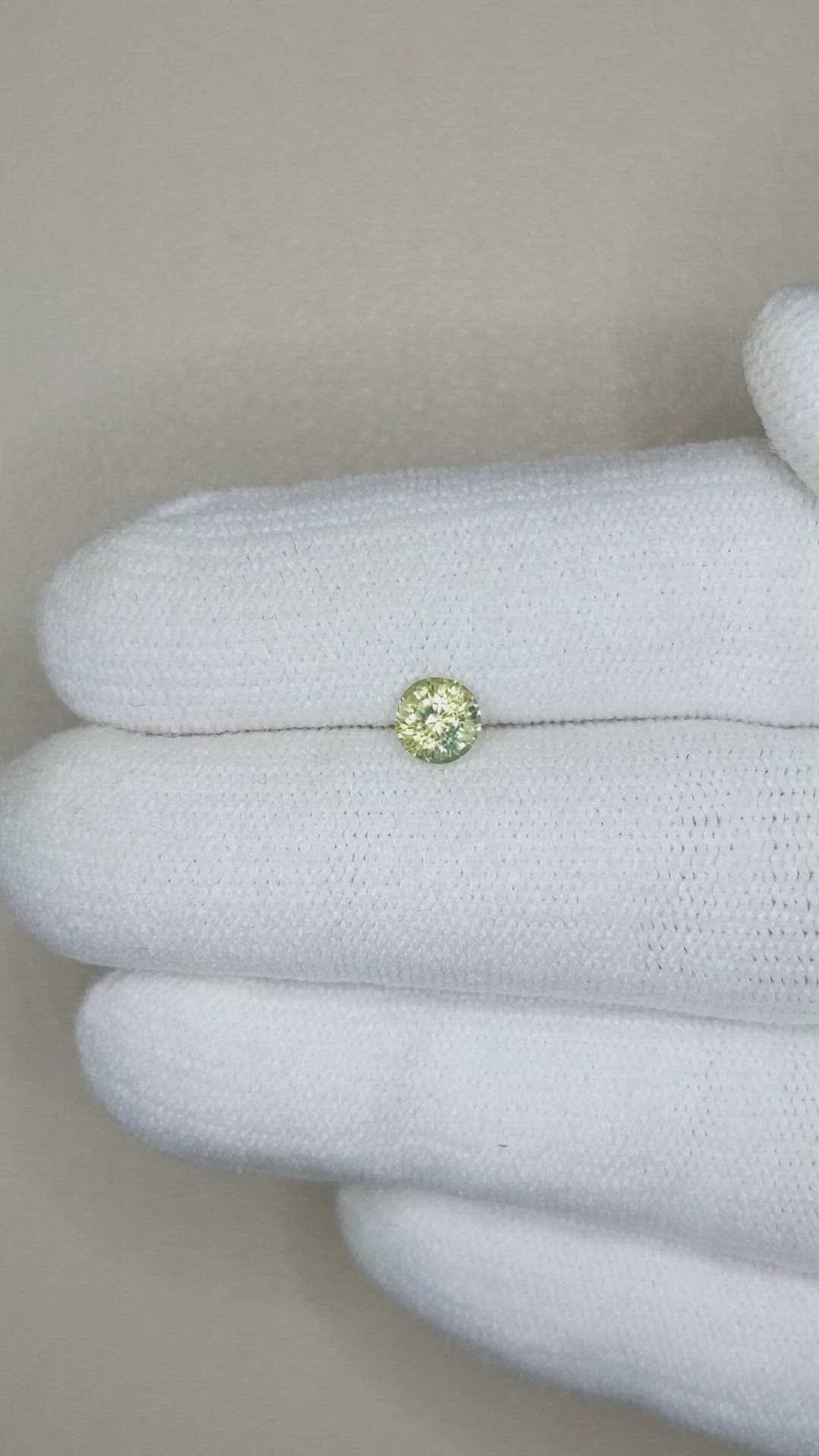 0.67 Ct. Yellowish Green Sapphire from Madagascar Size Video