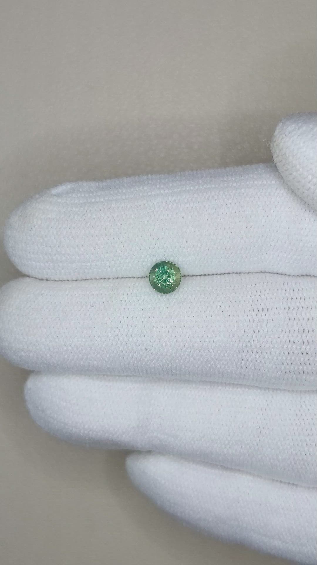 0.62 Ct. Bluish Green Sapphire from Madagascar Size Video