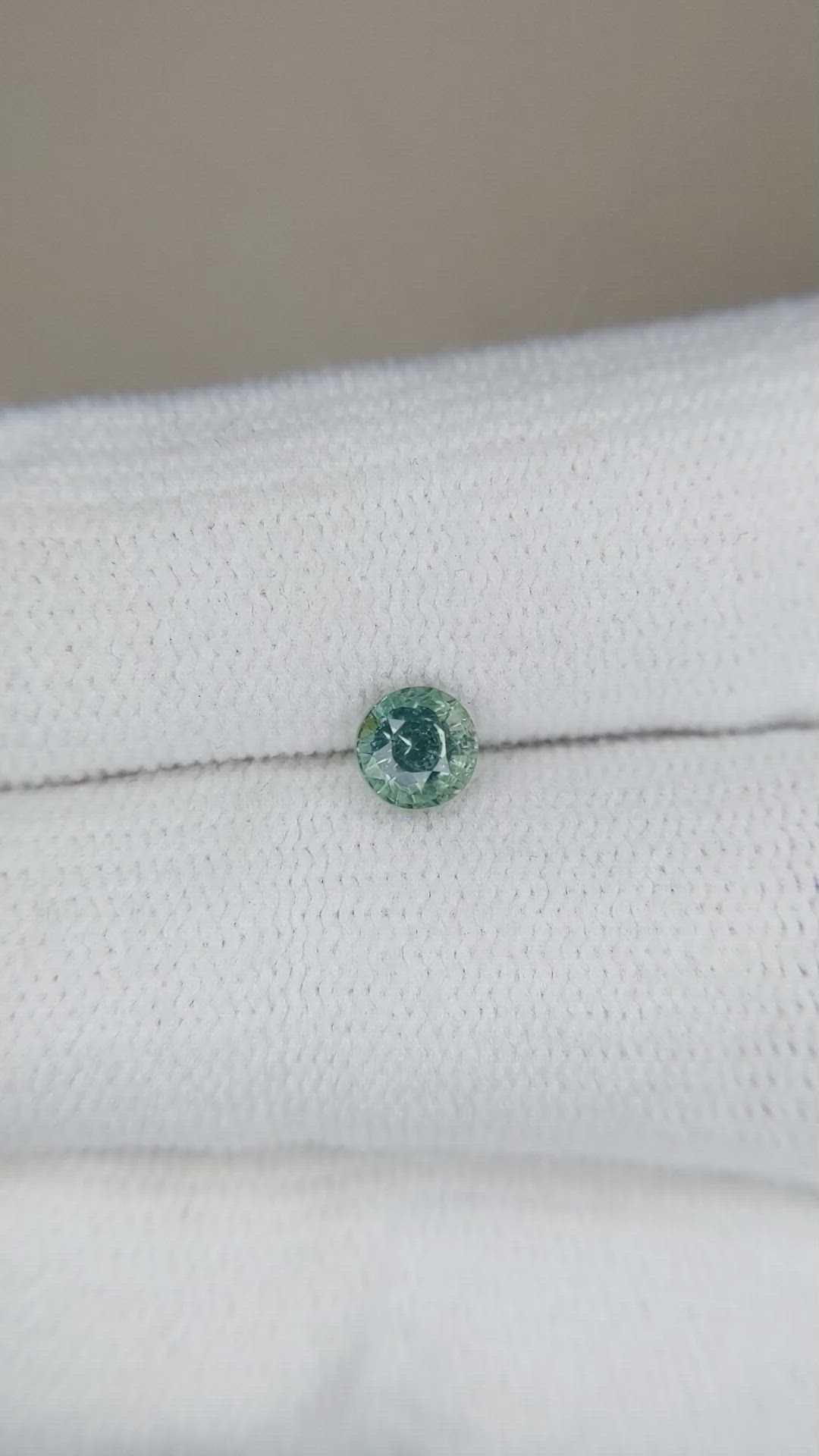 0.59 Ct. Bluish Green Sapphire from Madagascar Size Video