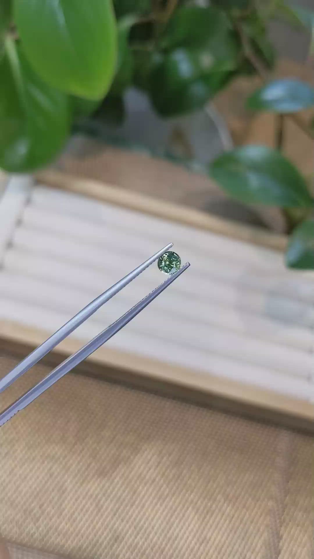 0.56 Ct. Bluish Green Sapphire from Madagascar Size Video