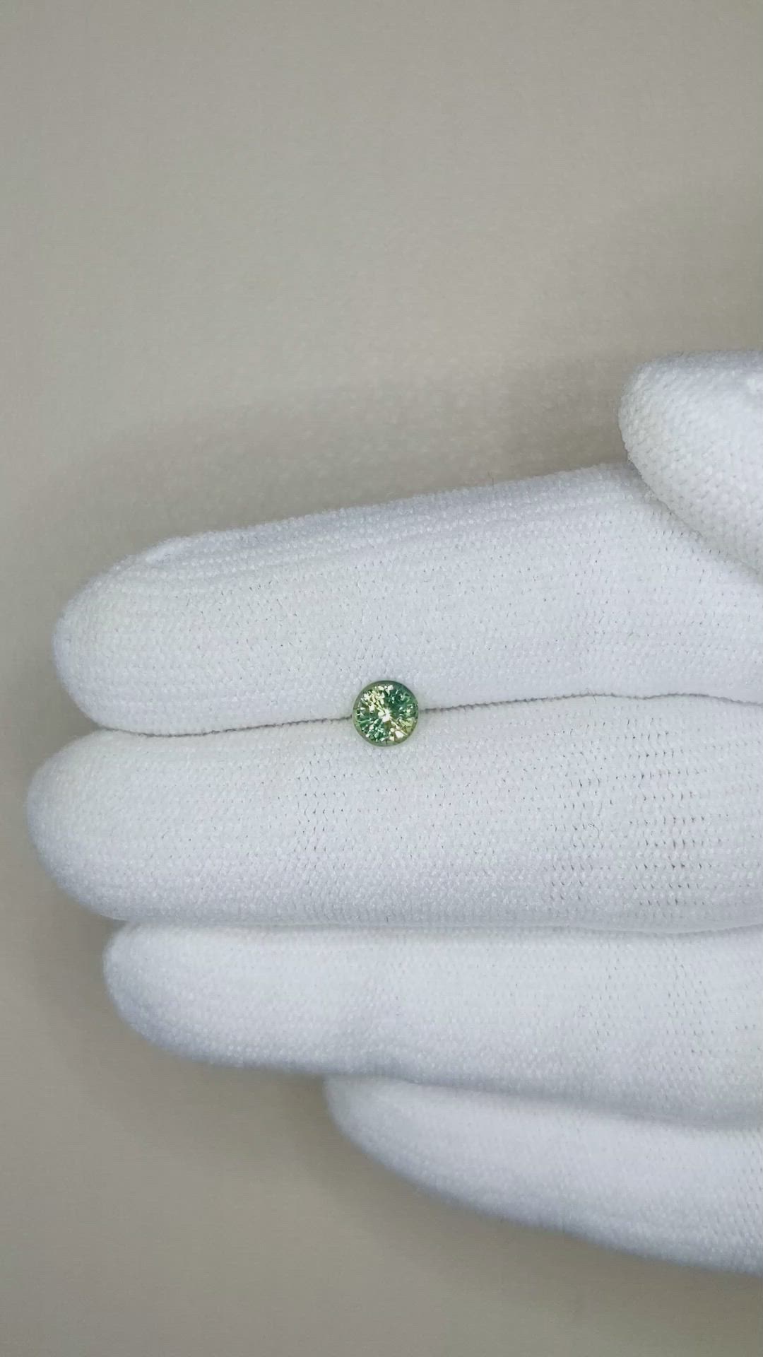 0.56 Ct. Bluish Green Sapphire from Madagascar Size Video