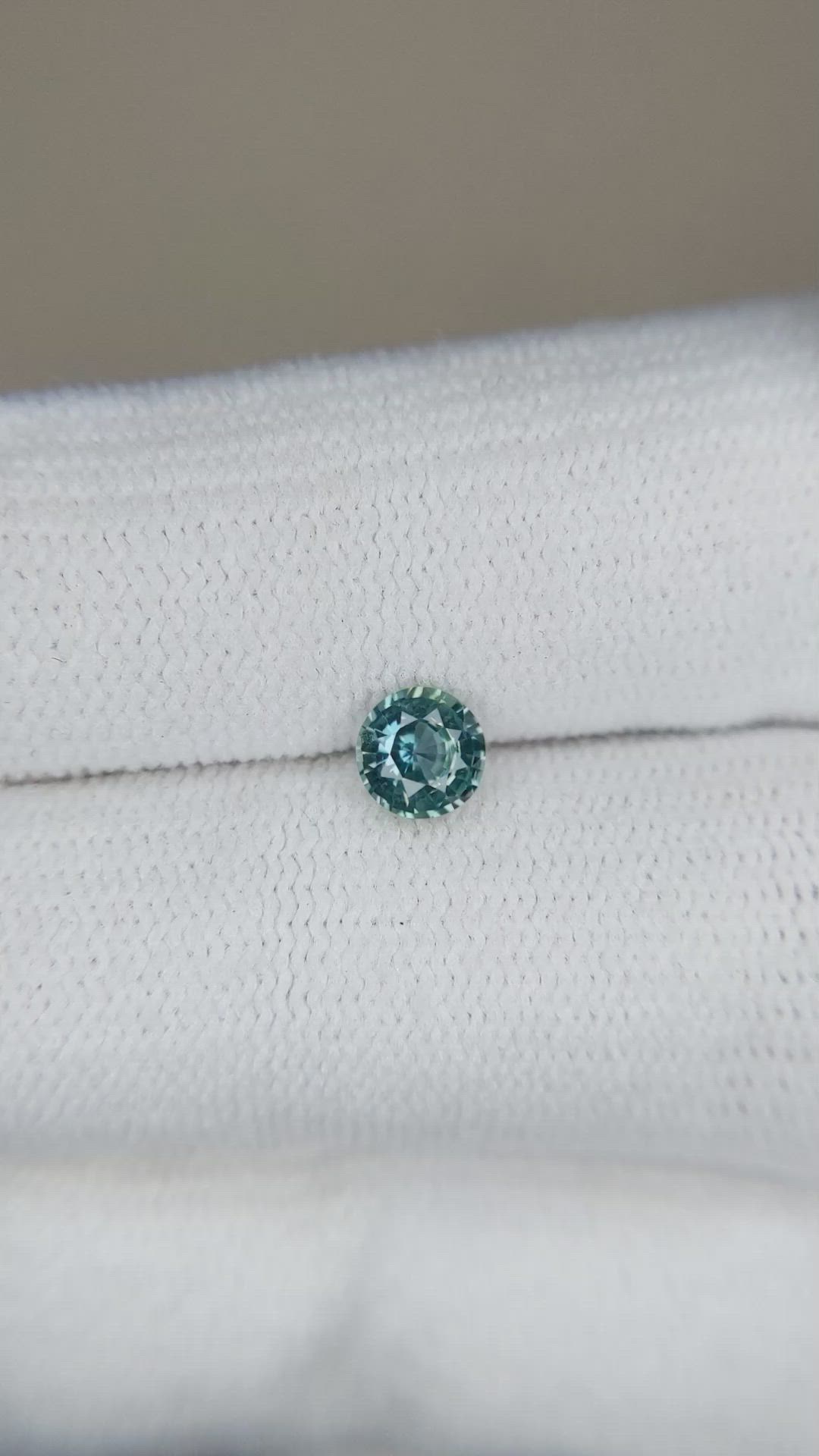 0.56 Ct. Greenish Blue Sapphire from Madagascar Size Video